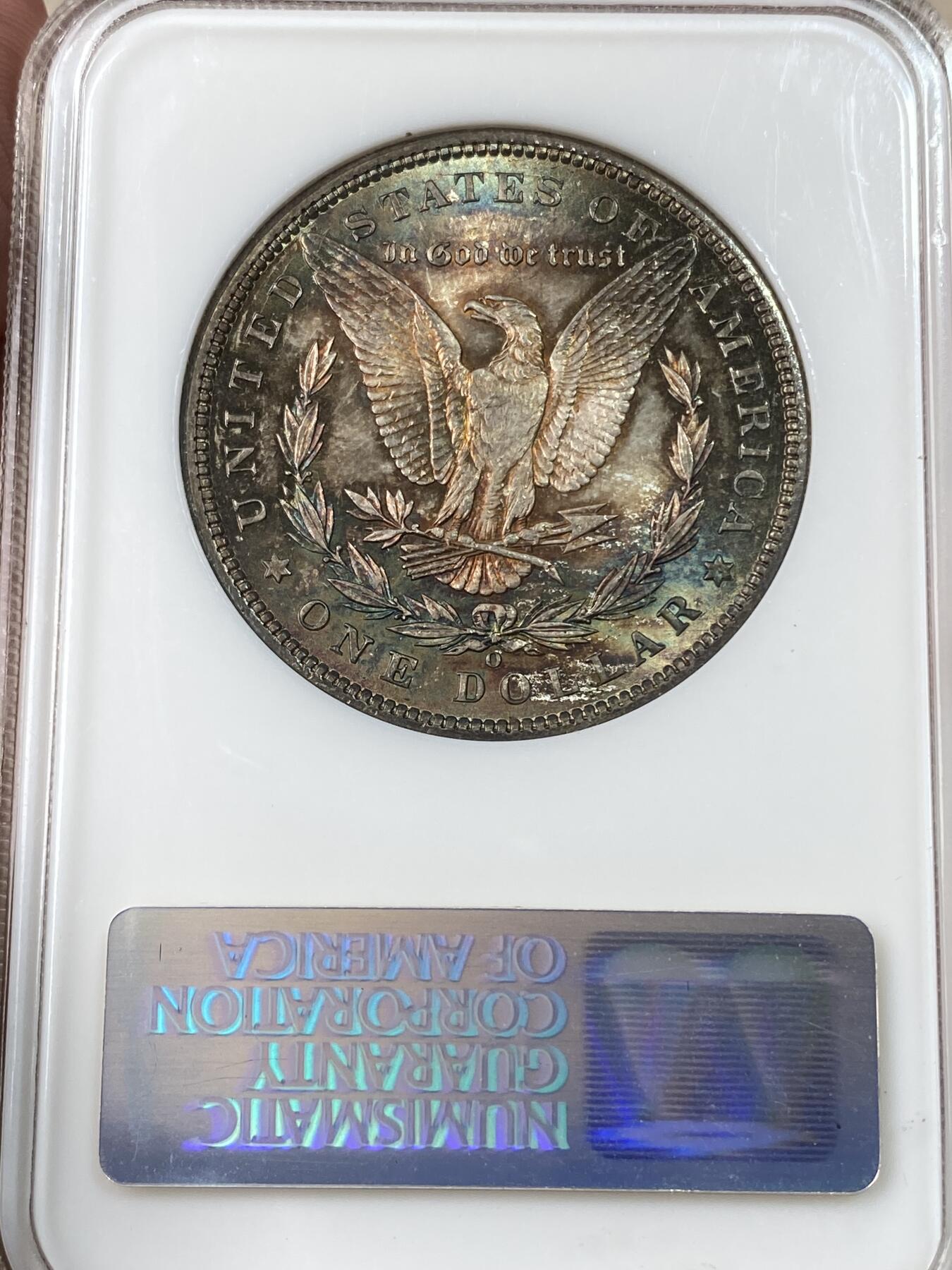 万国钱币拍卖第053期【万国秋季大拍下●周五周六两场连拍】 NGC MS65 1900年O版美国摩根女神一美元银币 BU金属质感油彩包浆 NGC老盒状态舒适