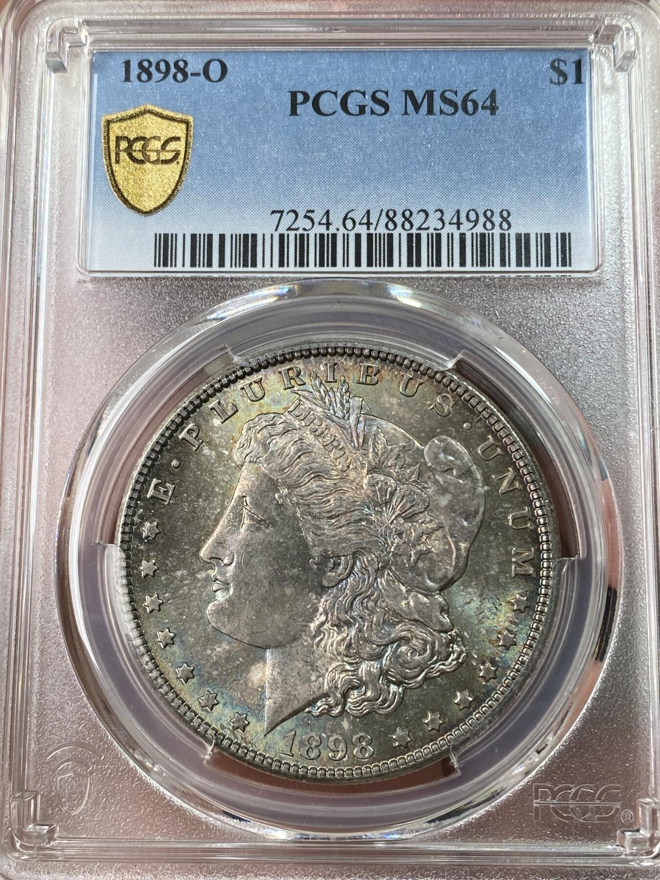 万国钱币拍卖第053期【万国秋季大拍下●周五周六两场连拍】 PCGS MS64 1898年O版美国摩根一元银币 丝滑转光 孔雀绿包浆全覆盖