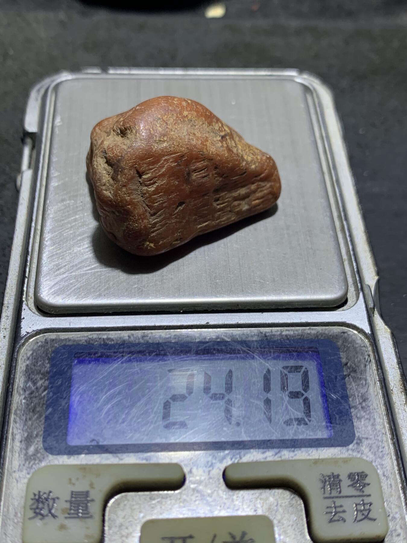 精美红皮未开窗南红玛瑙原石一颗