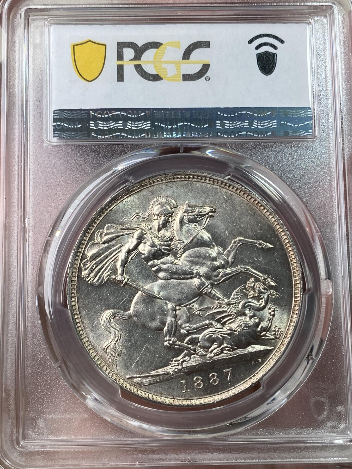 万国钱币拍卖第053期【万国秋季大拍上●周五周六两场连拍】 PCGS MS63 1887英国维多利亚女皇高冠马剑克朗 梦幻般的银霜转光质感