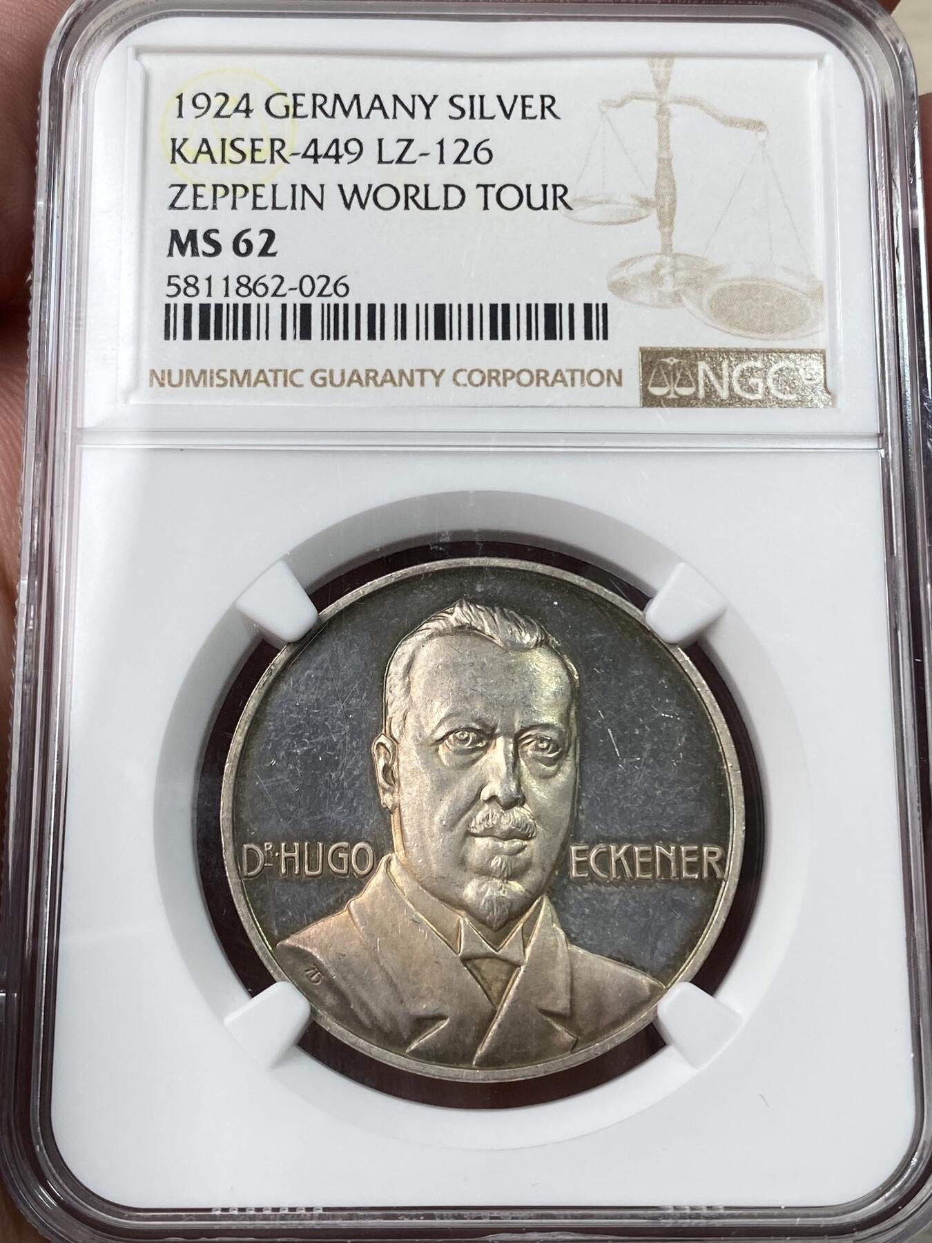 万国钱币拍卖第053期【万国秋季大拍上●周五周六两场连拍】 NGC MS62 1924年德国齐柏林伯爵飞艇成功环绕地球纪念银章 渐变式七彩非常赞