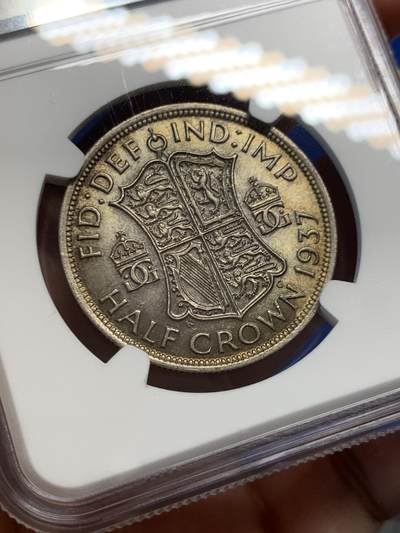 《竞宝斋》第429场 周日，周一，周二 3场连拍 （全场包邮） NGC AU58 英国1937年乔治六世半克朗银币，首年份，状态不错。