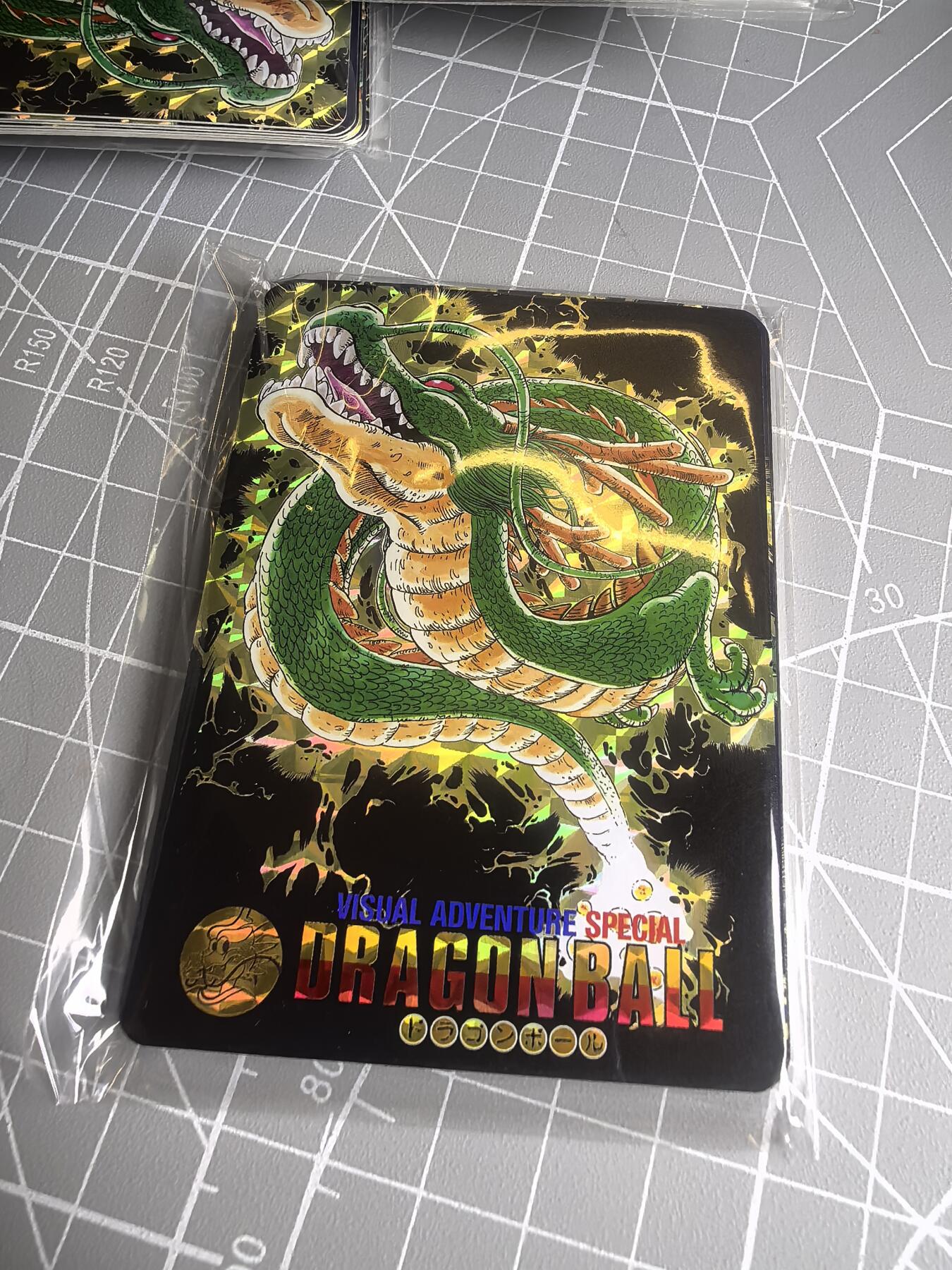 第二十六场拍卖 无佣金 不寄存 不寄存  不寄存 部分卡牌设有底价 拒绝小号抬价 大家放心拍 所有拍品全部有卡膜 自制卡牌 不包厂瑕 放大镜 品控 勿拍 流拍商品会循环 感谢大家支持 留个关注 谢谢 大卡道卡牌 龙珠神龙格子闪 9张 全新未拆