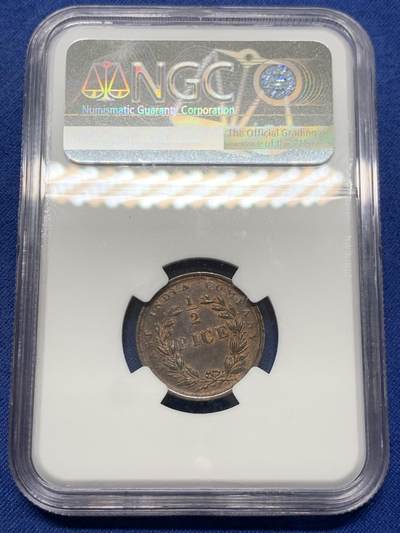 《竞宝斋》第429场 周日，周一，周二 3场连拍 （全场包邮） NGC MS62BN 英属东印度公司1853双狮1/2P铜币，很少见的品种与面值。同年法案规定，英属印度仍由东印度公司管理，1858年转交英政府直辖。双狮面部毛发清晰可数，状态极佳。