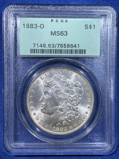 《竞宝斋》第429场 周日，周一，周二 3场连拍 （全场包邮） - PCGS MS63 美国1883-O版摩根银币一元，少见绿色老盒子，底板干净，霜感十足，背面微黄油彩，很舒服的一枚
