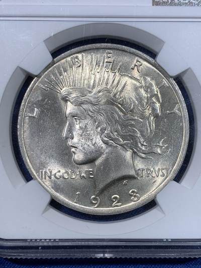 《竞宝斋》第429场 周日，周一，周二 3场连拍 （全场包邮） NGC MS63 美国1923年和平银元，转光强烈细节优秀，状态极佳。
