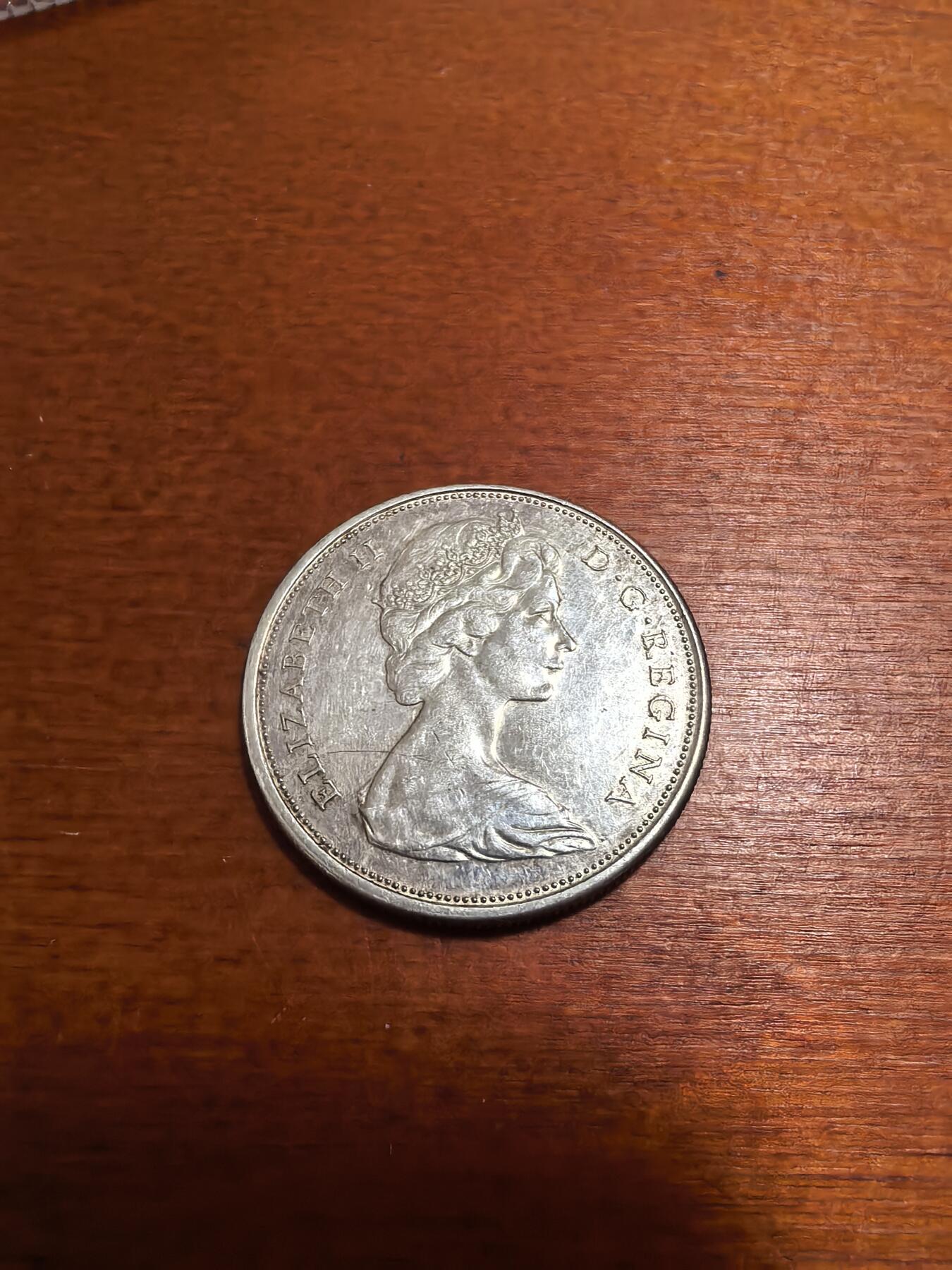 长老汇蛇年精选第六十五场拍卖 1965加拿大国徽50分银币，11.66克800银