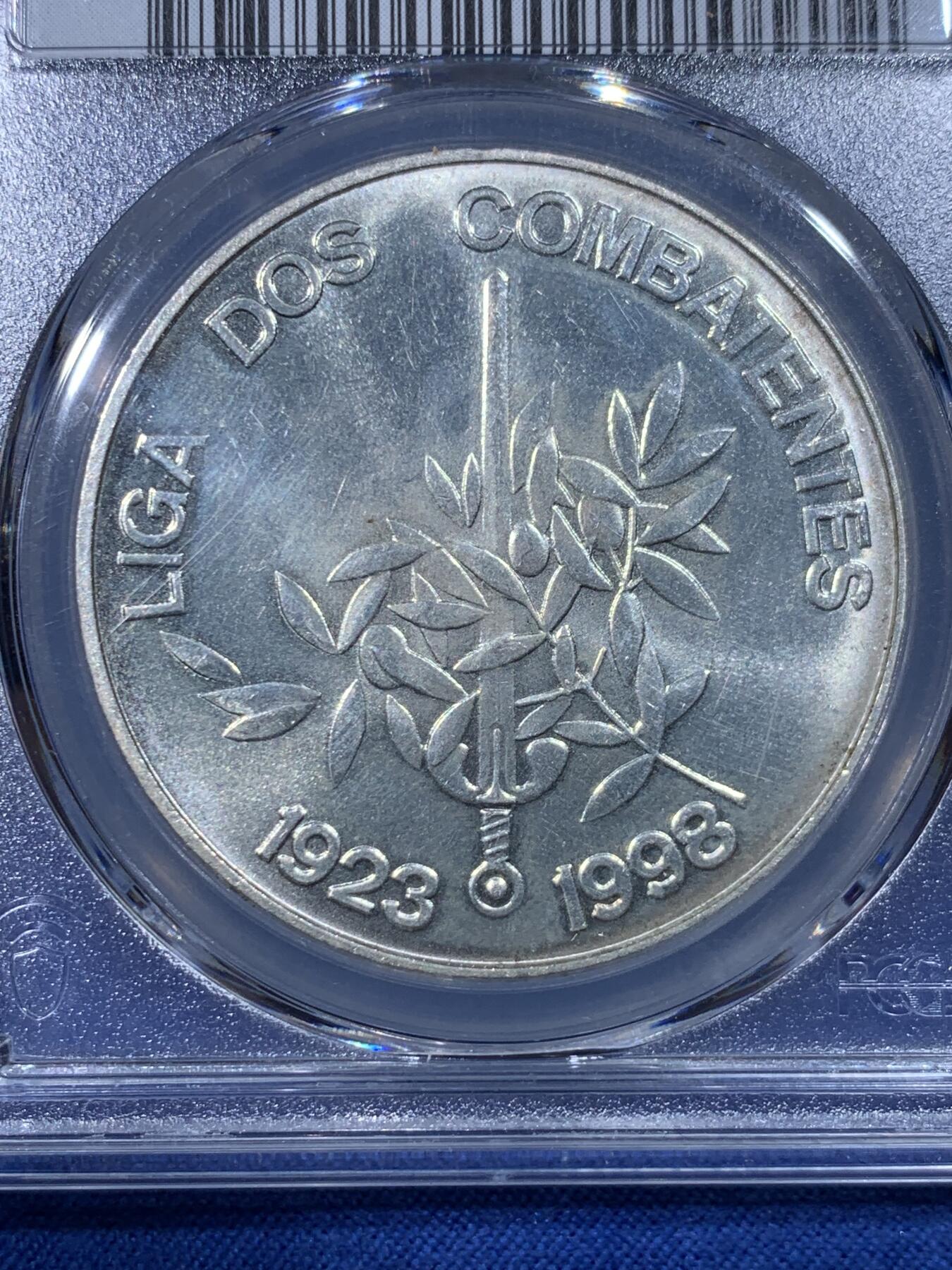 《竞宝斋》第430场 周日，周一，周二 3场连拍 （全场包邮） PCGS UNC 葡萄牙1998年发行联盟战争纪念75周年1000埃斯库多 28.2克 40MM。带原光