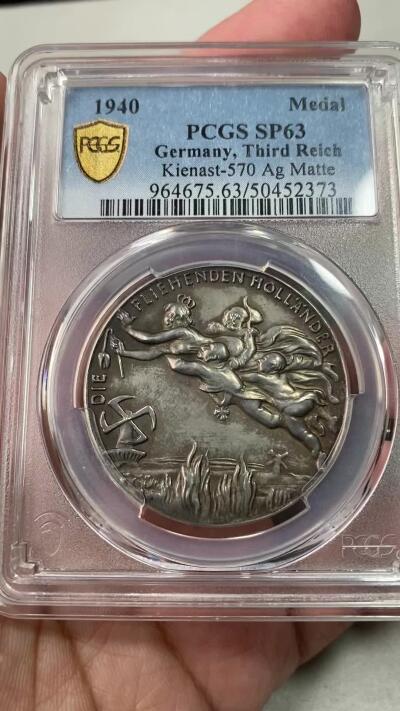 万国钱币拍卖第053期【万国秋季大拍下●周五周六两场连拍】 PCGS SP63 1940年德国民族社会主义工人党占领荷兰纪念银章 卡尔哥茨大师技艺 尼德兰风车变为万字 郁金香的凋零 三帝国珍稀品种之一 无论品种还是品相皆属顶级 麦稀奇首拍 PC唯一亚军 更高分仅一枚（原图请私信后台或自行查询官网）