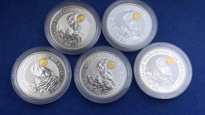 《竞宝斋》第430场 周日，周一，周二 3场连拍 （全场包邮） 五枚一组 澳大利亚1997年笑翠鸟镶嵌金猫银币，每枚含纯银1盎司，纯金约0.5g