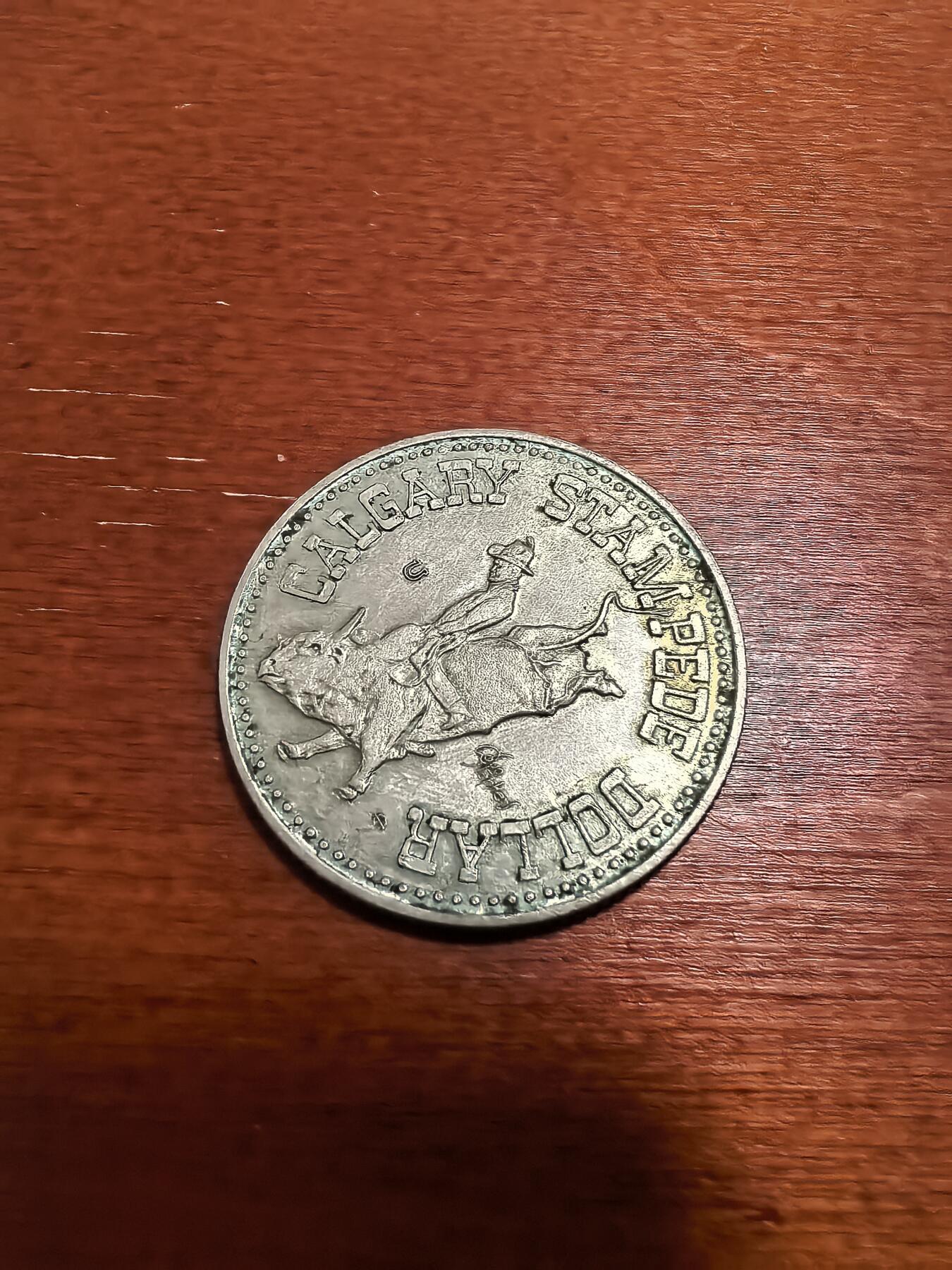 长老汇蛇年精选第六十五场拍卖 1976加拿大阿尔伯塔州卡尔加里奔牛1元铜镍代币，13克，33MM，马铁标