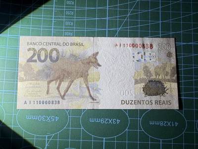 【炜奕收藏】，第四十八期，多套港澳日本纸币 巴西现版200雷亚尔，UNC品相，中夹狮子号无47尾8