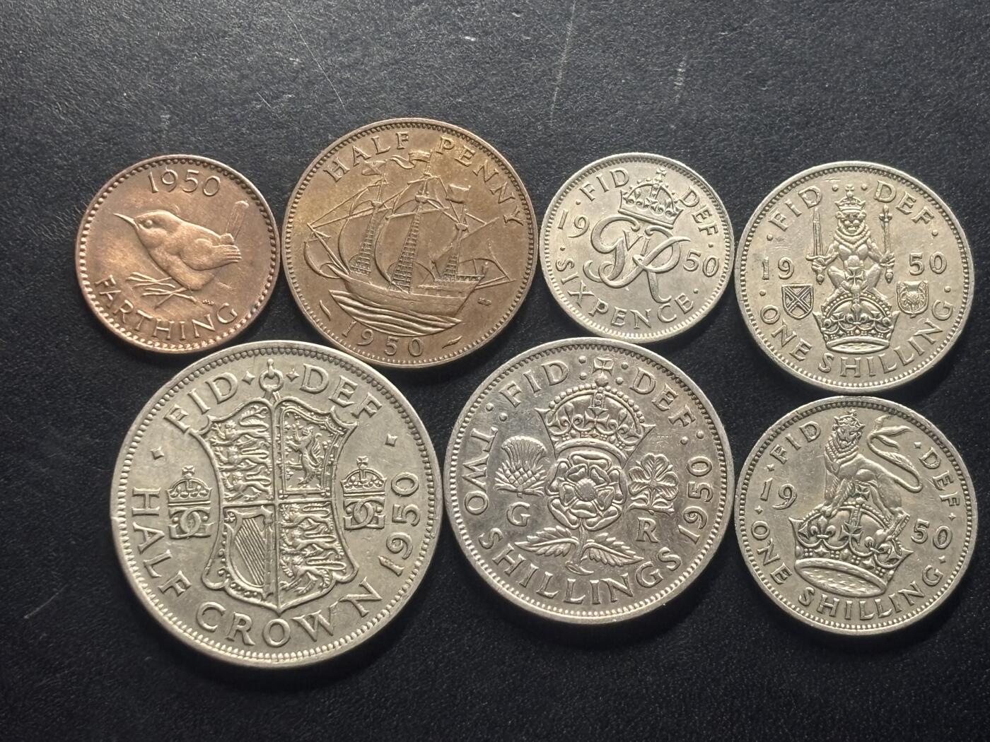 邮泉阁限时拍卖第三十二场 英国硬币专场（硬币在国外。请付邮费6元。） 英国乔治六世国王1950年7枚