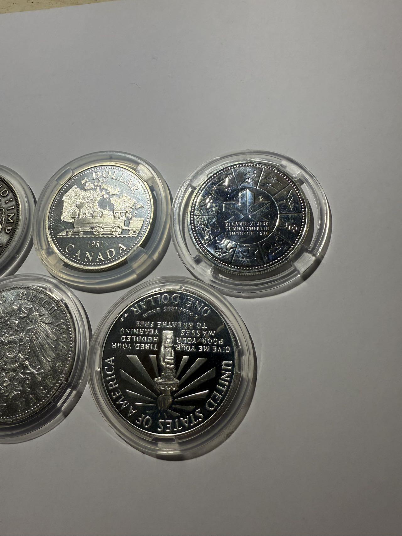 《外钞收藏家》第五百七十七期（精品场）（本平台长期征集拍品、欢迎藏友们联系合作） 英国、加拿大、美国、德国5个银币，共129.4克