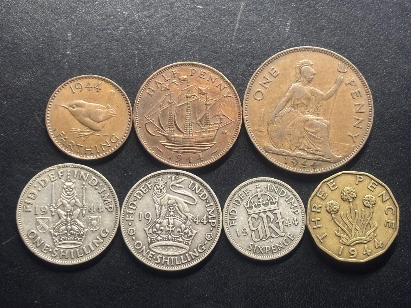 邮泉阁限时拍卖第三十二场 英国硬币专场（硬币在国外。请付邮费6元。） 英国乔治六世国王1944年3银4铜