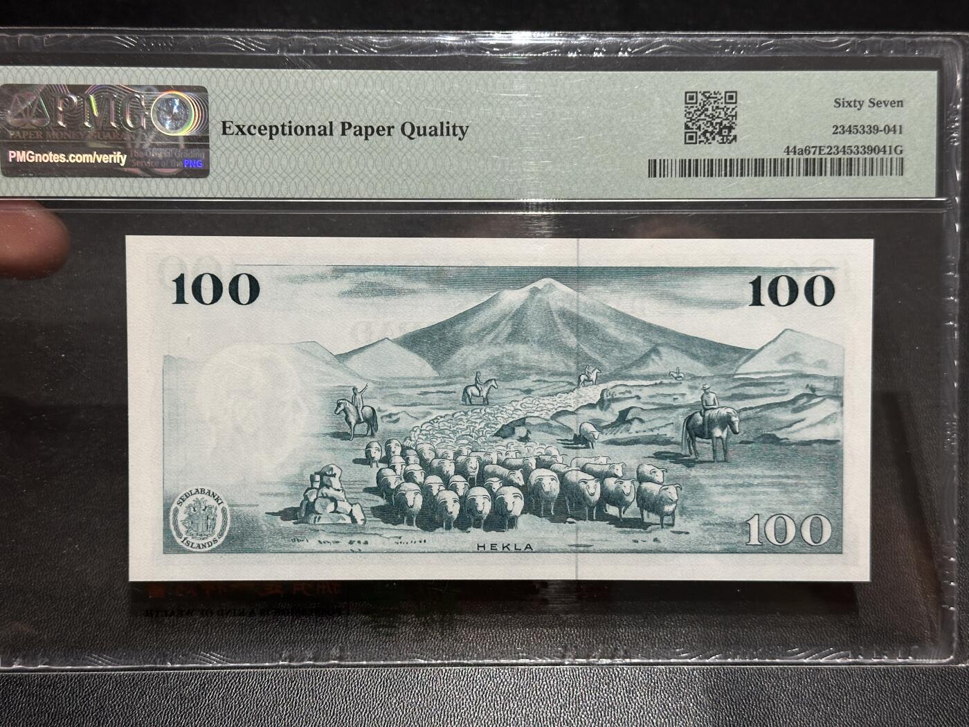 《外钞收藏家》第五百七十七期（精品场）（本平台长期征集拍品、欢迎藏友们联系合作） 1961年冰岛100克朗 BWC版 PMG67