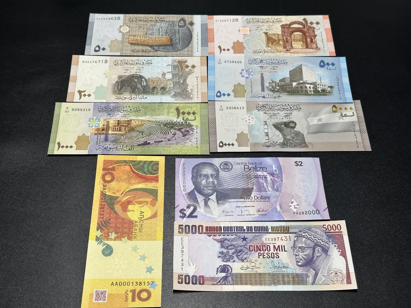 《外钞收藏家》第五百七十七期（精品场）（本平台长期征集拍品、欢迎藏友们联系合作） 叙利亚6张一套+阿布哈兹10 AA冠+伯利兹2元 数三豹子号+几内亚比绍5000 一起 全新UNC