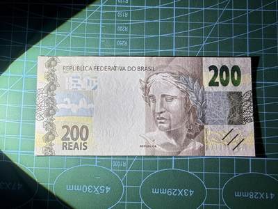 【炜奕收藏】，第四十八期，多套港澳日本纸币 巴西现版200雷亚尔，UNC品相，中夹狮子号无47尾8