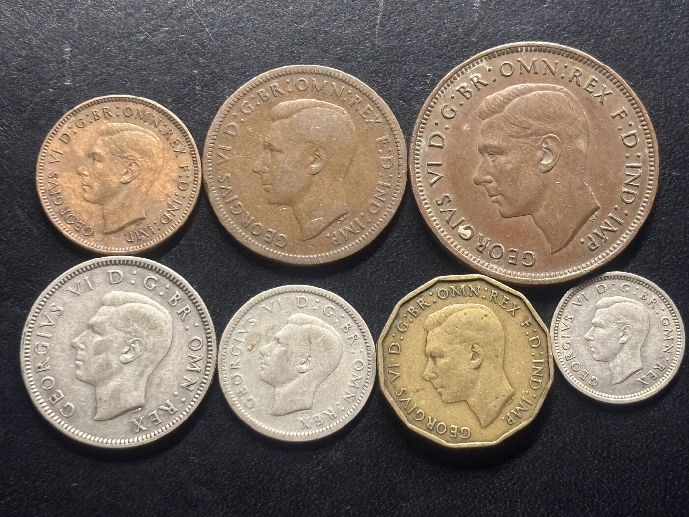邮泉阁限时拍卖第三十二场 英国硬币专场（硬币在国外。请付邮费6元。） 英国乔治六世国王1937年3银4铜