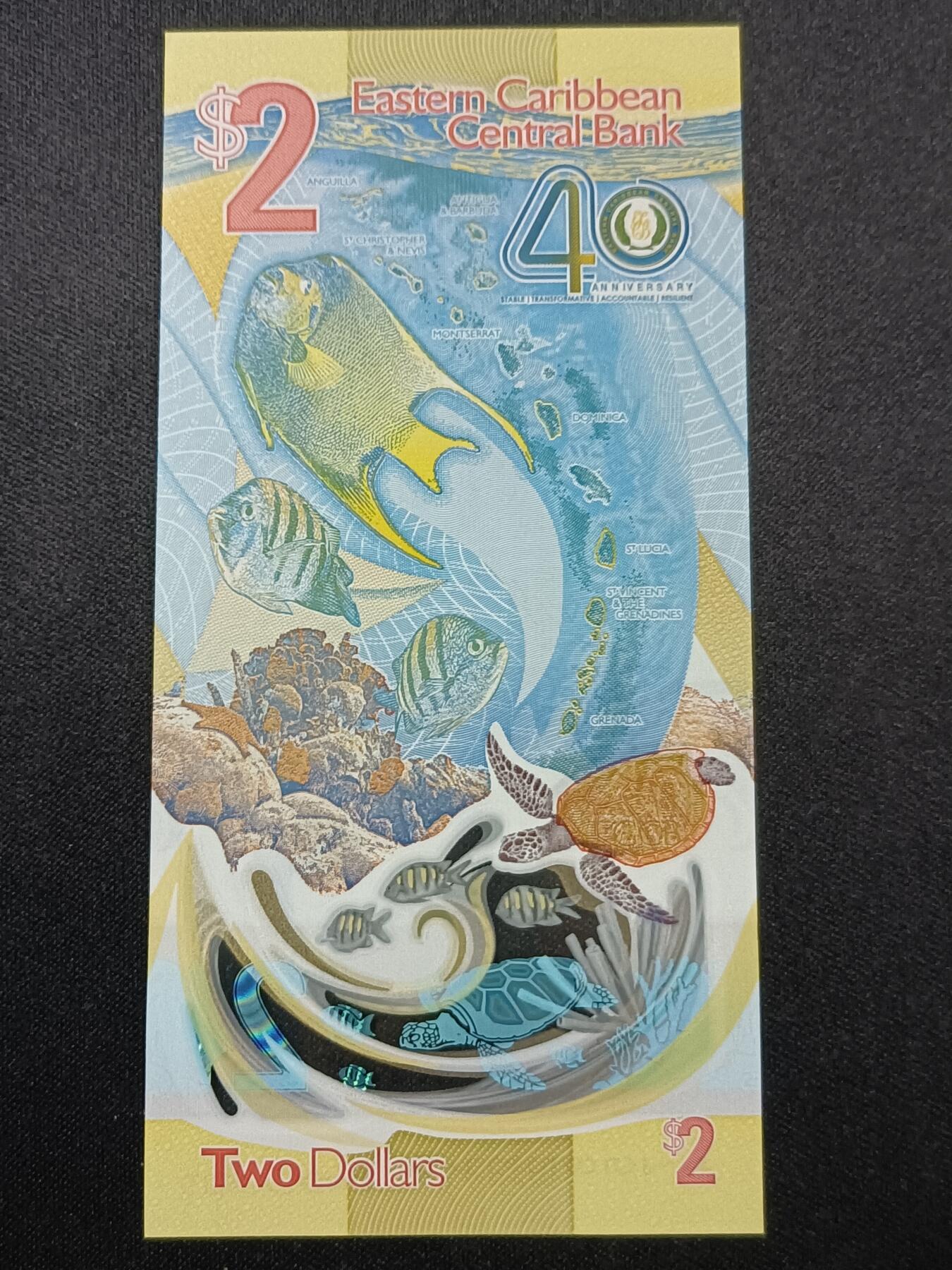 【游宝拍卖】乙巳蛇年81期  东加勒比-2元【IBNS-2023年度世界最佳钞票 全新UNC】