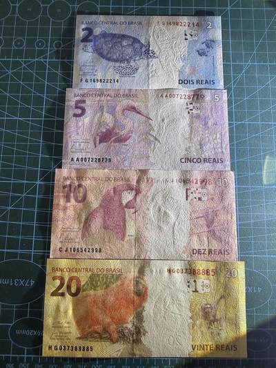 【炜奕收藏】，第四十八期，多套港澳日本纸币 巴西现版2-20雷亚尔，UNC品相，包含一张AA冠