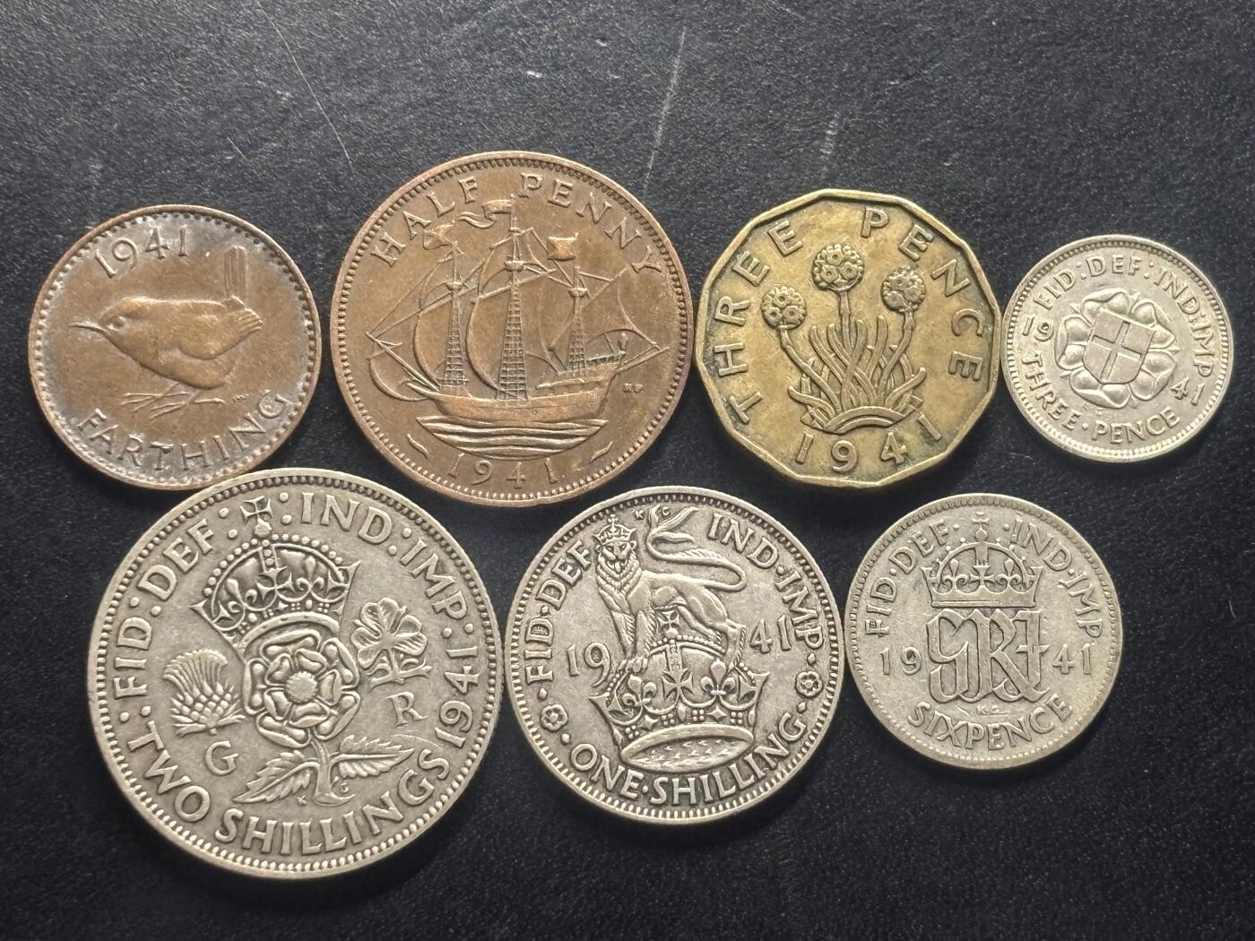 邮泉阁限时拍卖第三十二场 英国硬币专场（硬币在国外。请付邮费6元。） 英国乔治六世国王1941年4银3铜