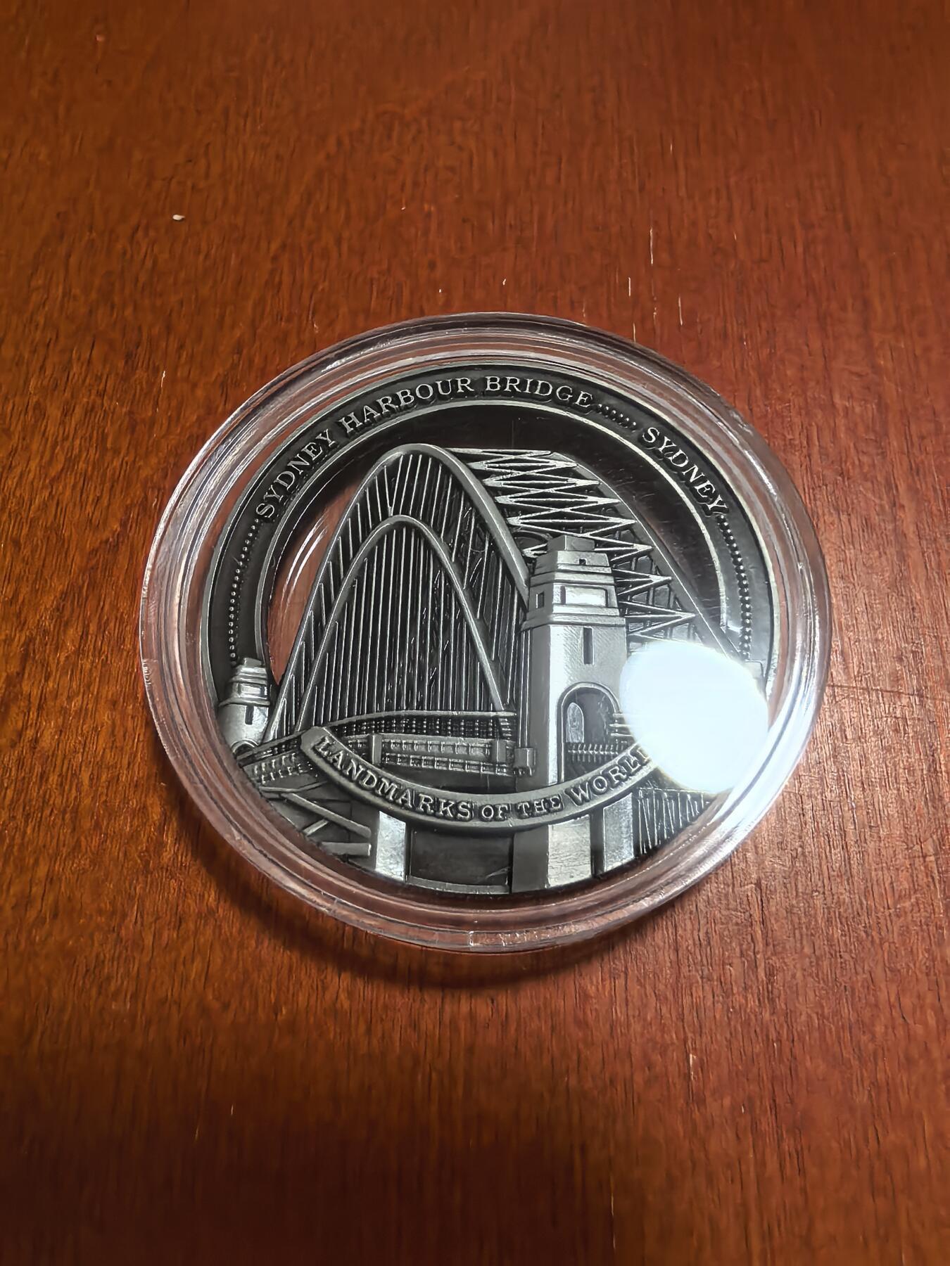 长老汇蛇年精选第六十六场拍卖 2022库克世界地标建筑之悉尼海港大桥镂空1/2新西兰元纪念币，铜镍合金，50MM，重量28.5-42克，9999枚