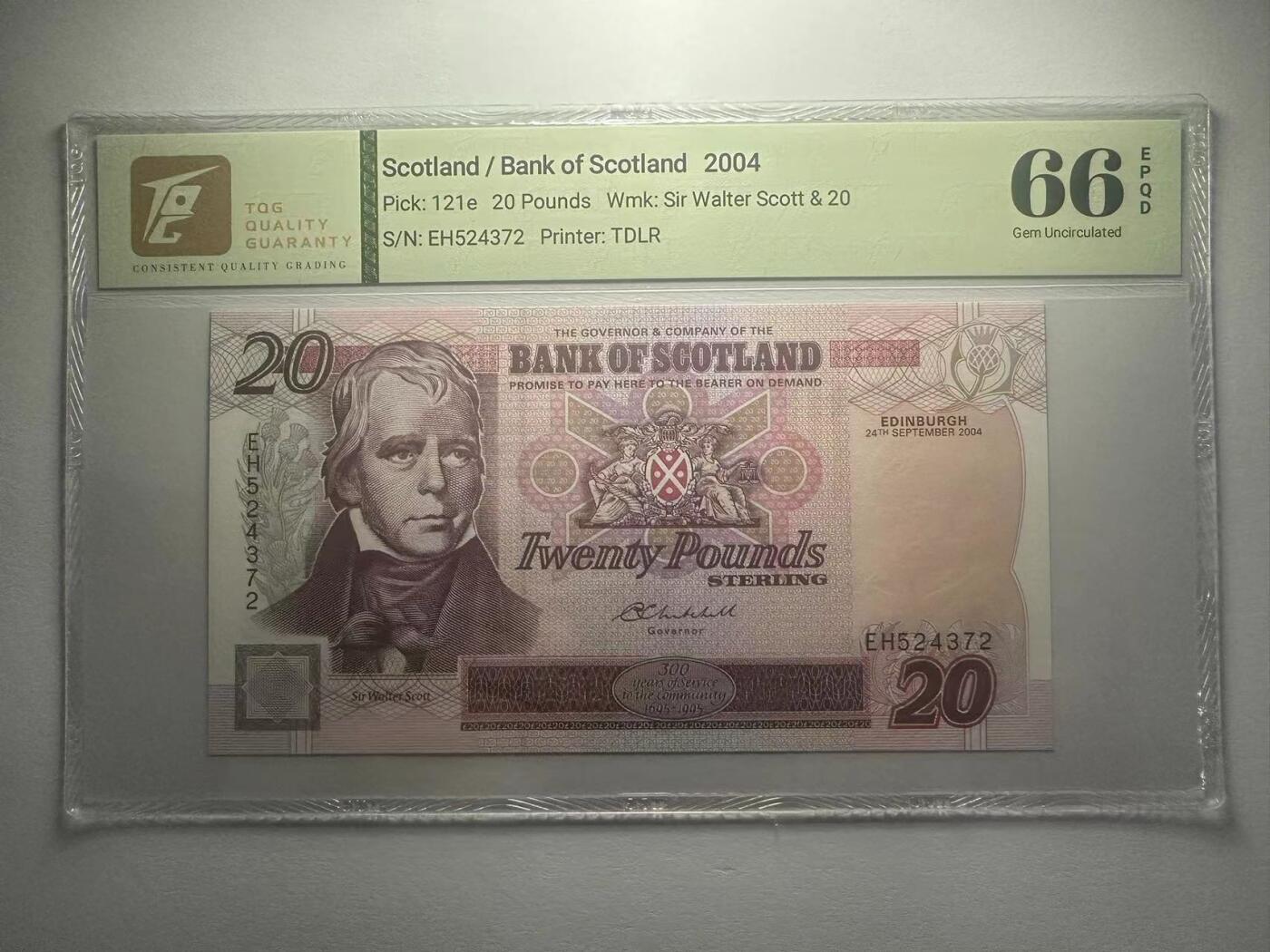 喜羊羊钱币收藏2025第10期(原相机拍摄普惠场) 苏格兰/苏格兰银行	P-121e 2004年20镑		66E				EH524372			