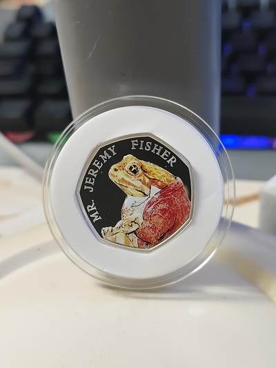 第179期拍卖【长期征集拍品】 - 英国2017年彼得兔系列青蛙杰里米费希尔先生纪念银币，925银，发行30000枚