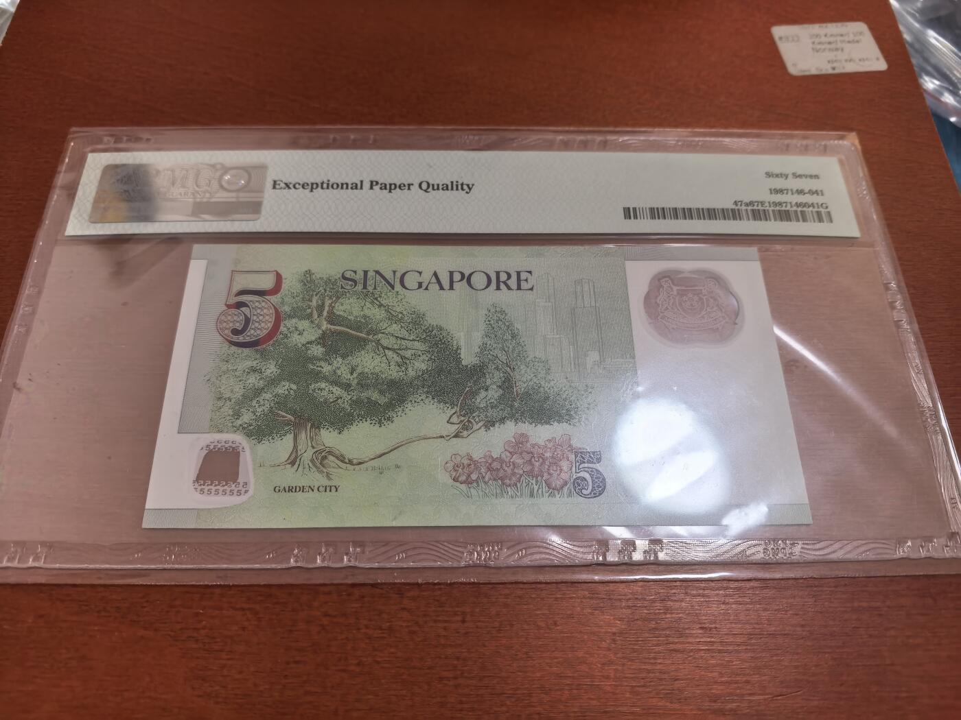 长老汇蛇年精选第六十七场拍卖 2005新加坡5元塑料钞，PMG 67，串号无47