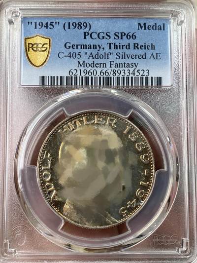 万国钱币拍卖第053期【万国秋季大拍上●周五周六两场连拍】 - PCGS SP66 1945年（实际1989年）后铸德国民族社会主义工人党党首镀银铜制纪念章 彩虹彩包浆原光深度镜面（原图请私信后台或自行查询官网）