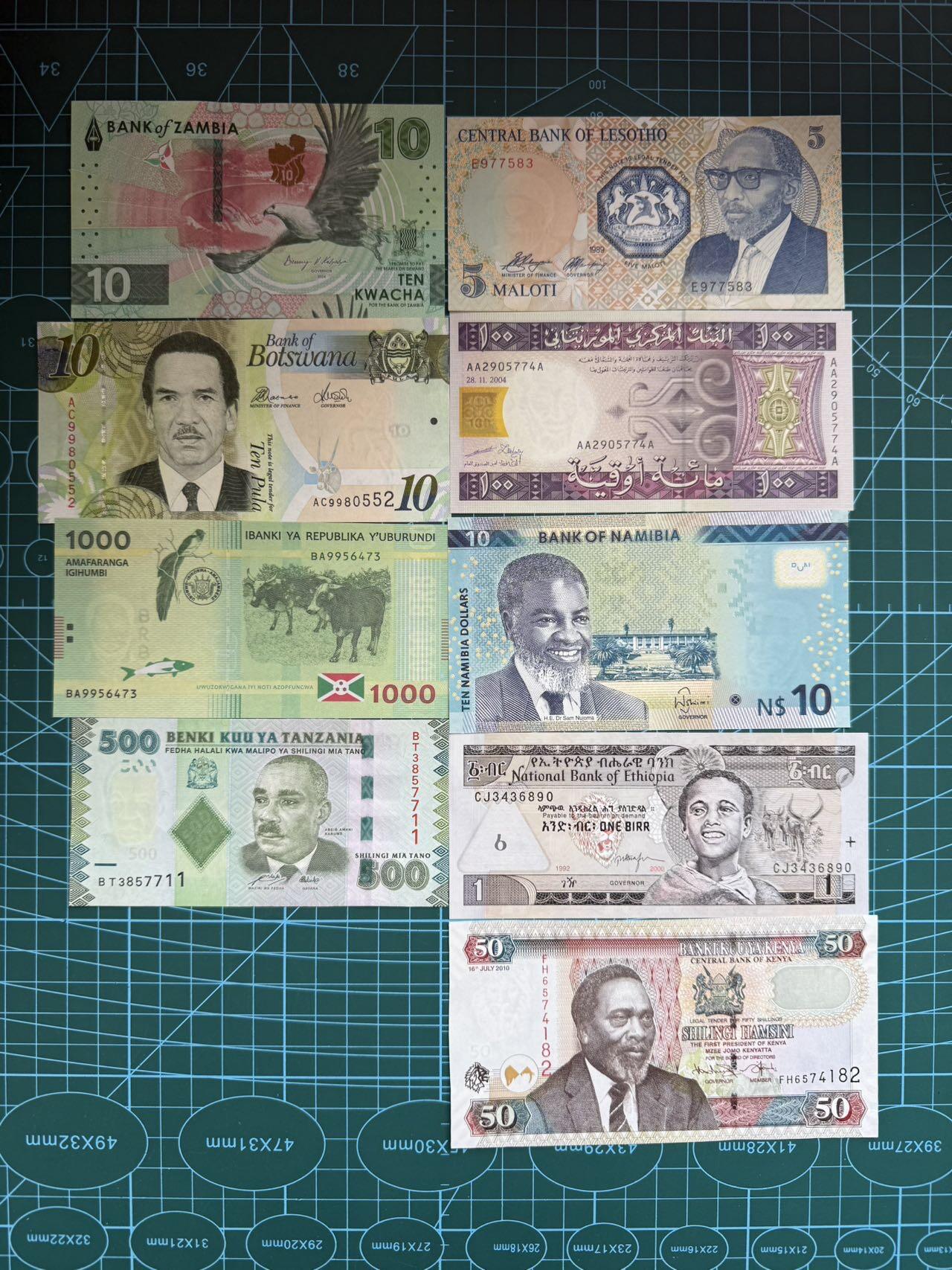 【炜奕收藏】，第四十九期，多套加拿大纸币、港澳靓号 非洲杂钞共9张，UNC品相，包含多张无47