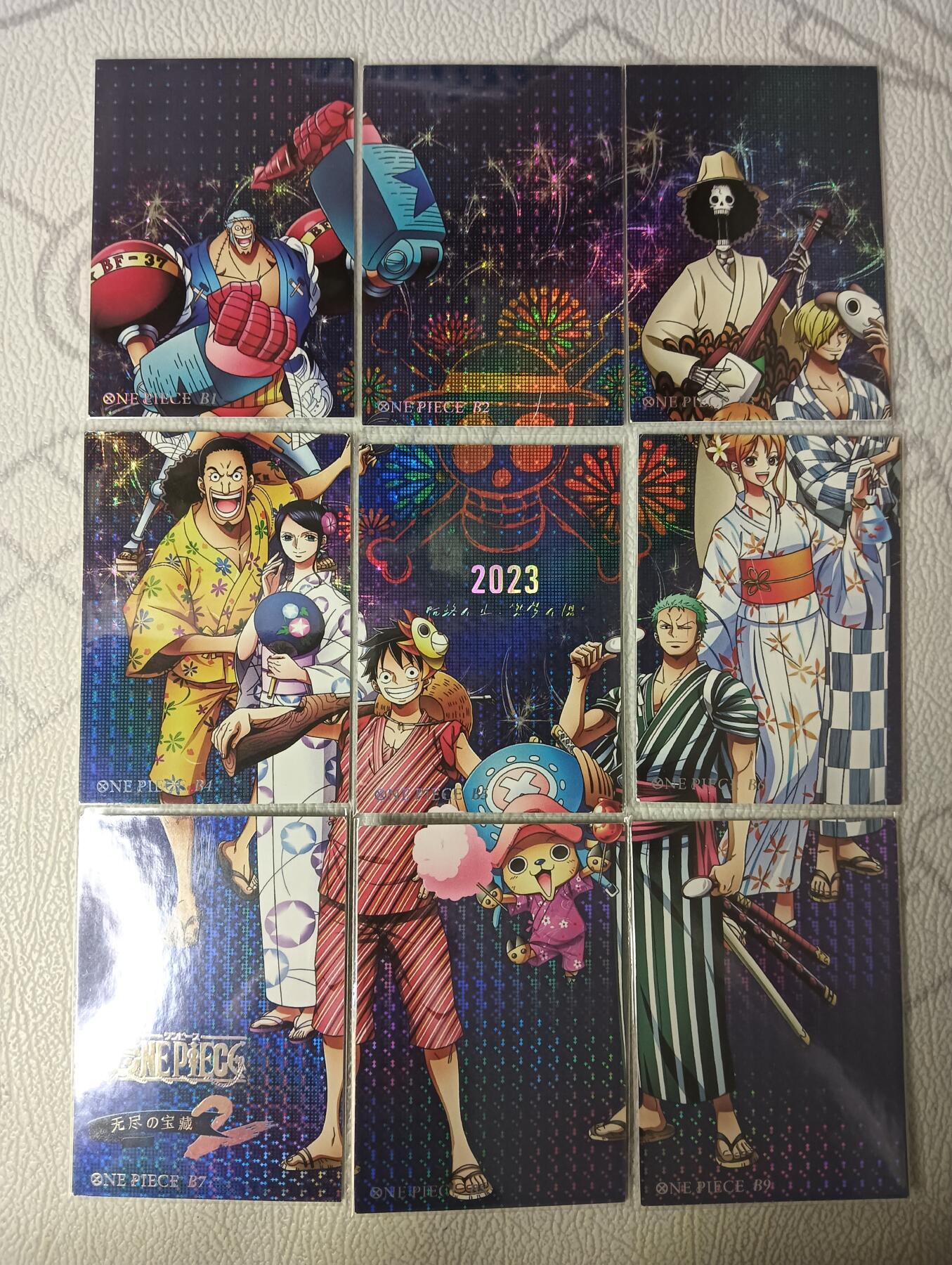 花开卡拍第44期（10月26号周日截拍，品控勿拍!!!拍品不寄存，运费5元，自制卡难免瑕疵，可能存在轻微撞角爆边等出厂瑕疵，品控介意勿拍！） 卡巴戈拼图  海贼王  9拼四套36张，有点爆白边爆角