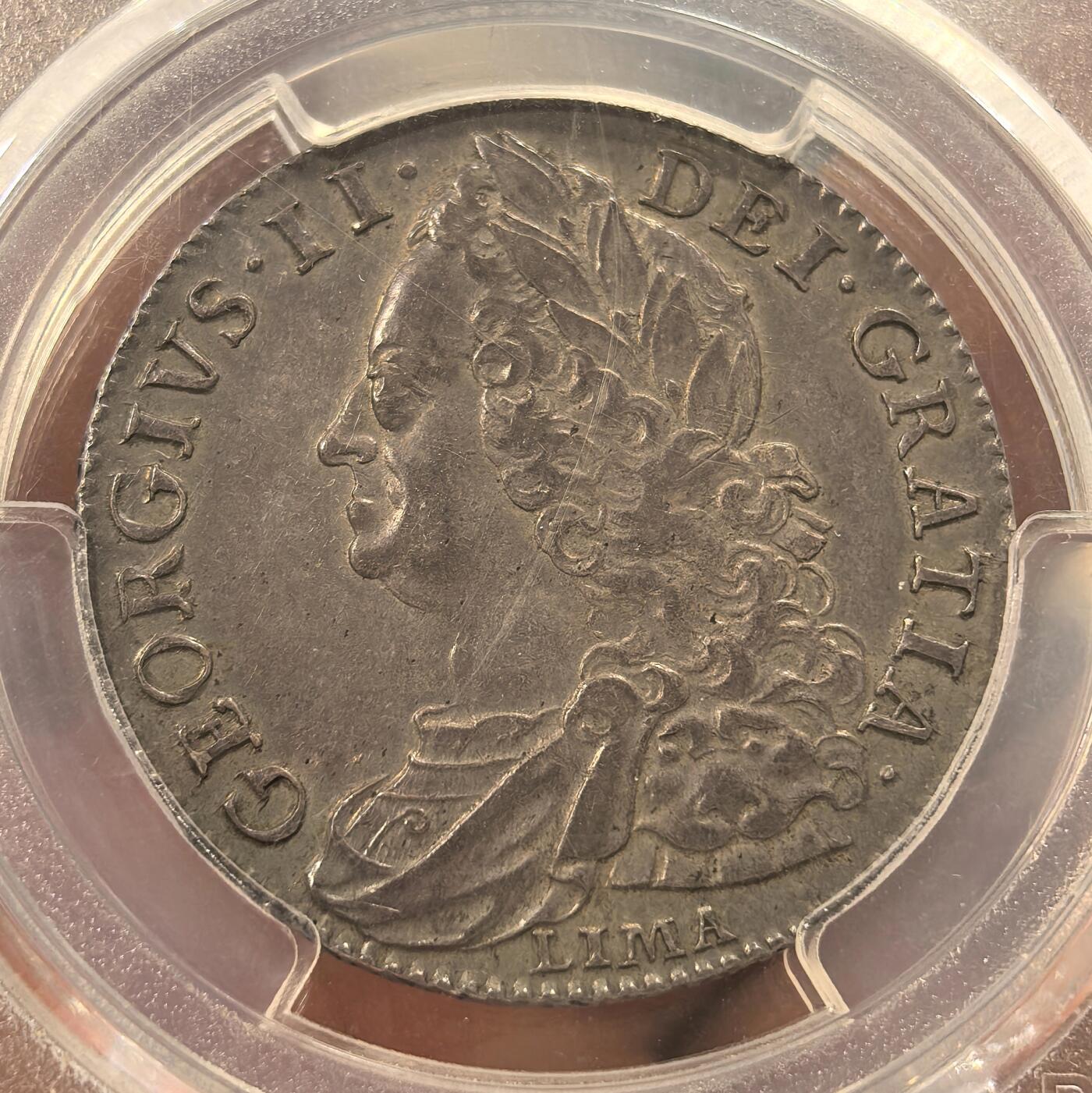 博洋堂世界钱币拍卖第144期（全场包邮） PCGS AU55 英国1746年乔二半克朗银币，整个币面均匀包覆在灰色带彩包浆下，币面光度一流，状态绝对超出同类分数。