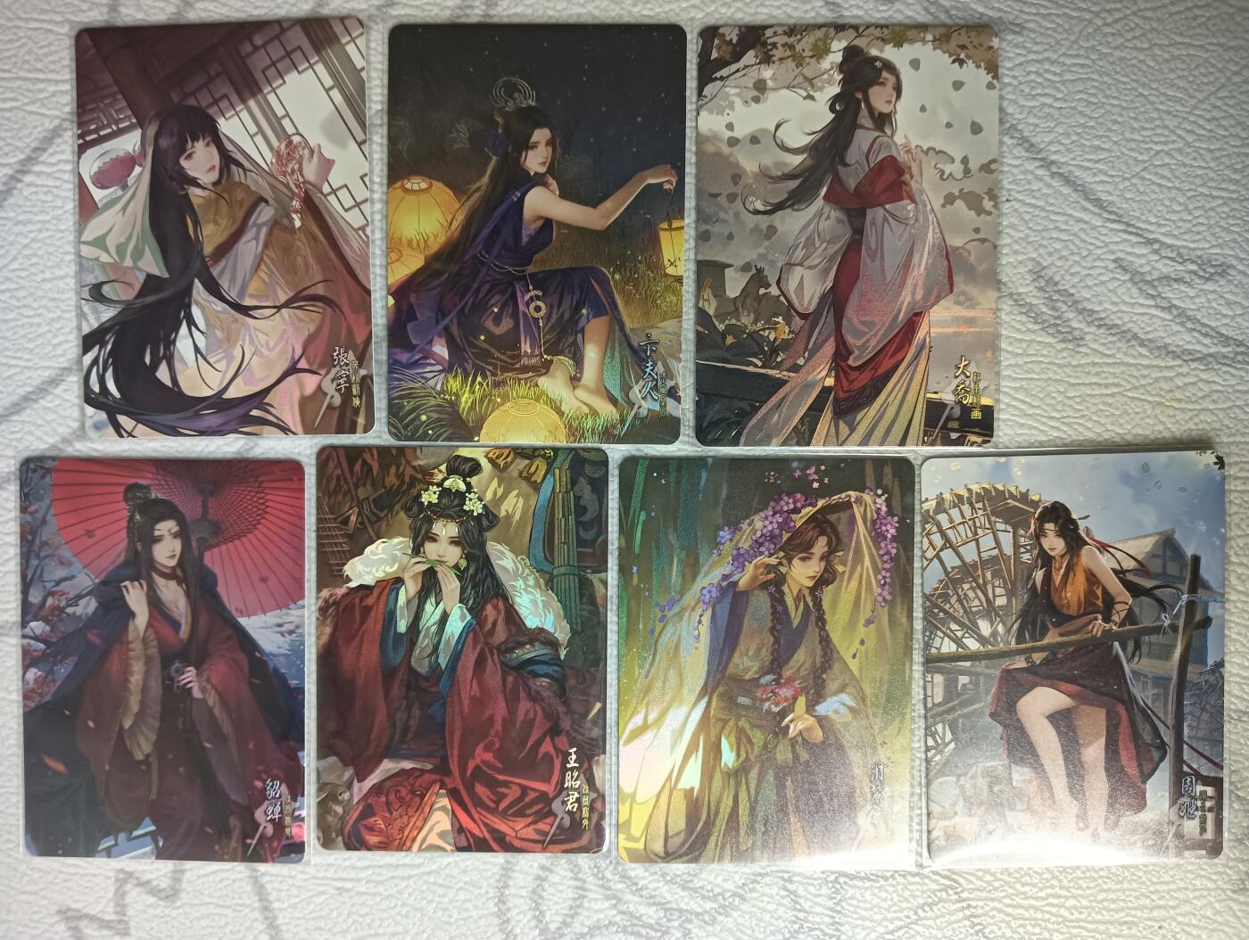 花开卡拍第44期（10月26号周日截拍，品控勿拍!!!拍品不寄存，运费5元，自制卡难免瑕疵，可能存在轻微撞角爆边等出厂瑕疵，品控介意勿拍！） 鸡腿卡牌 三国女武将 7张 彩闪