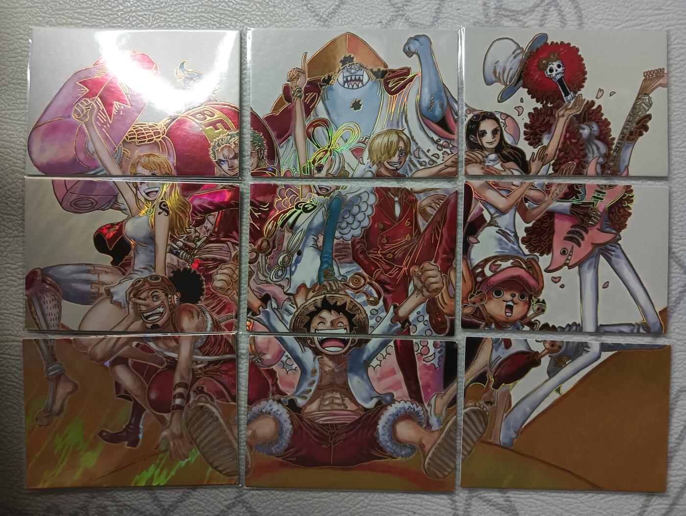 花开卡拍第44期（10月26号周日截拍，品控勿拍!!!拍品不寄存，运费5元，自制卡难免瑕疵，可能存在轻微撞角爆边等出厂瑕疵，品控介意勿拍！） 卡巴戈拼图  海贼王  9拼四套36张，有点爆白边爆角