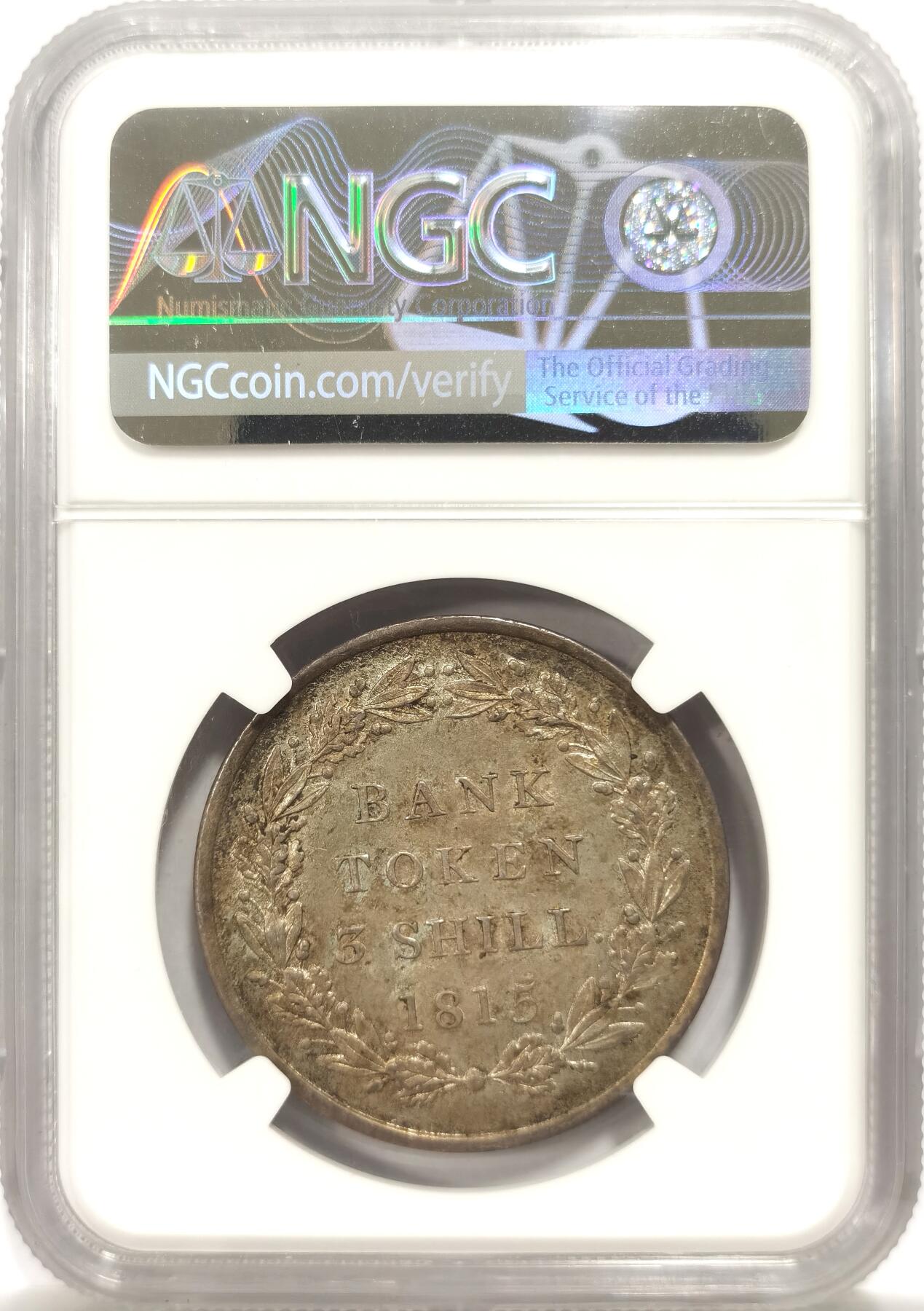 博洋堂世界钱币拍卖第144期（全场包邮） NGC MS64 英国1815年乔三3先令银币，包浆和币面状态一流，整体呈现如丝绸般光泽，数量稀少，个人认为严重被低估的品种