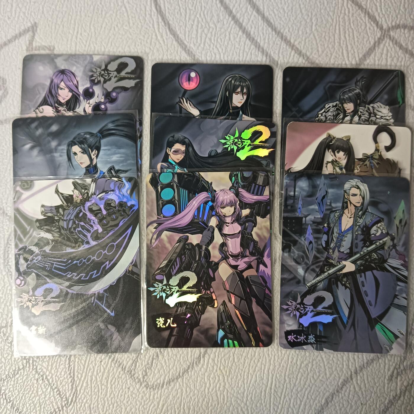 花开卡拍第44期（10月26号周日截拍，品控勿拍!!!拍品不寄存，运费5元，自制卡难免瑕疵，可能存在轻微撞角爆边等出厂瑕疵，品控介意勿拍！） 影之刃2 人物立绘 1套9张 彩闪