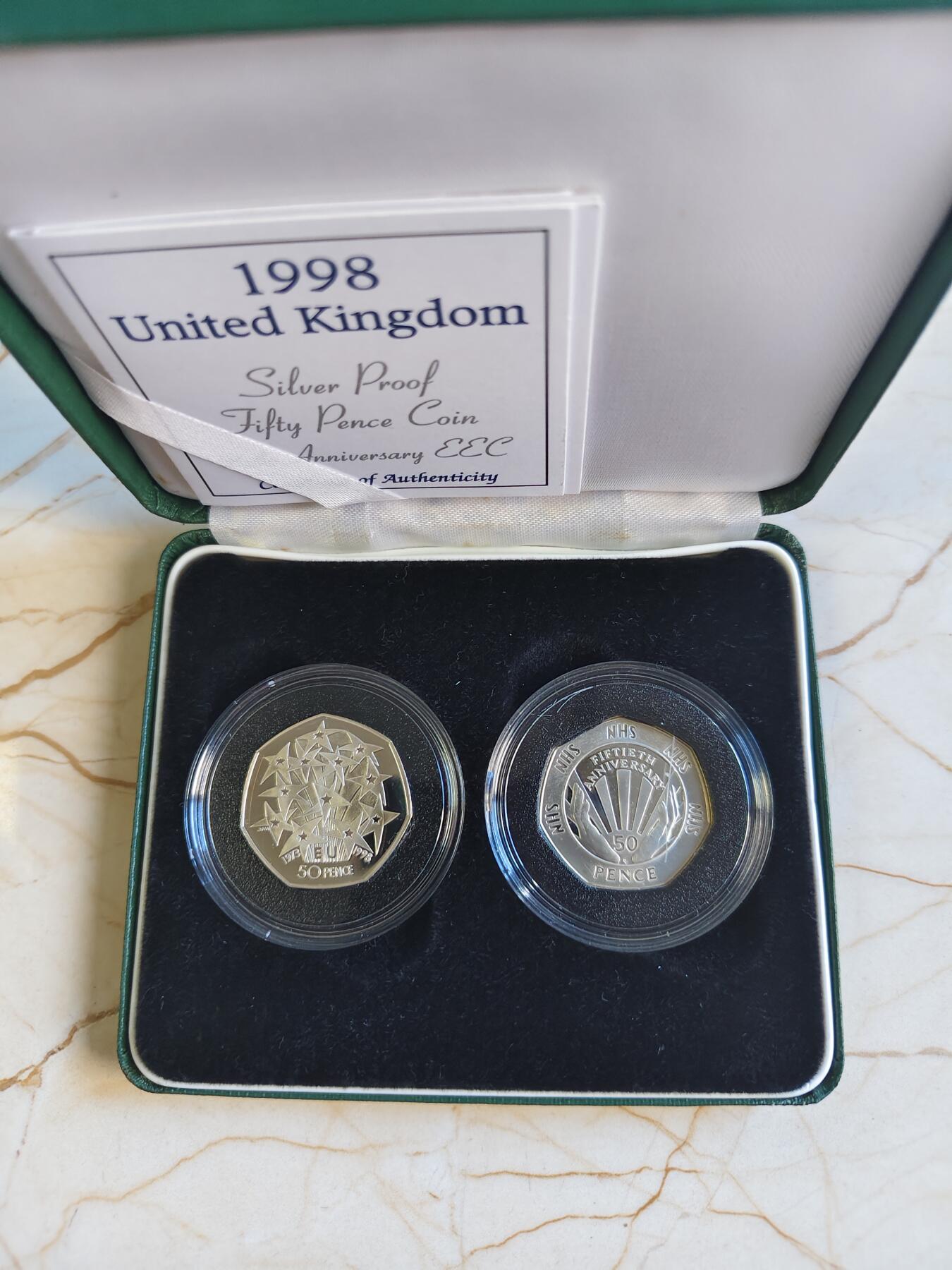 第179期拍卖【长期征集拍品】 英国1998年欧共体和国家医疗50便士银币一对，8克*2，925银，有氧化