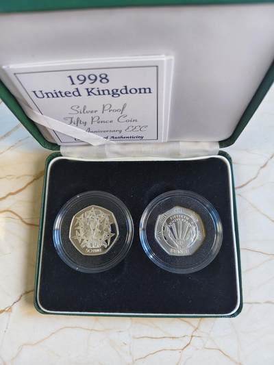 第179期拍卖【长期征集拍品】 - 英国1998年欧共体和国家医疗50便士银币一对，8克*2，925银，有氧化
