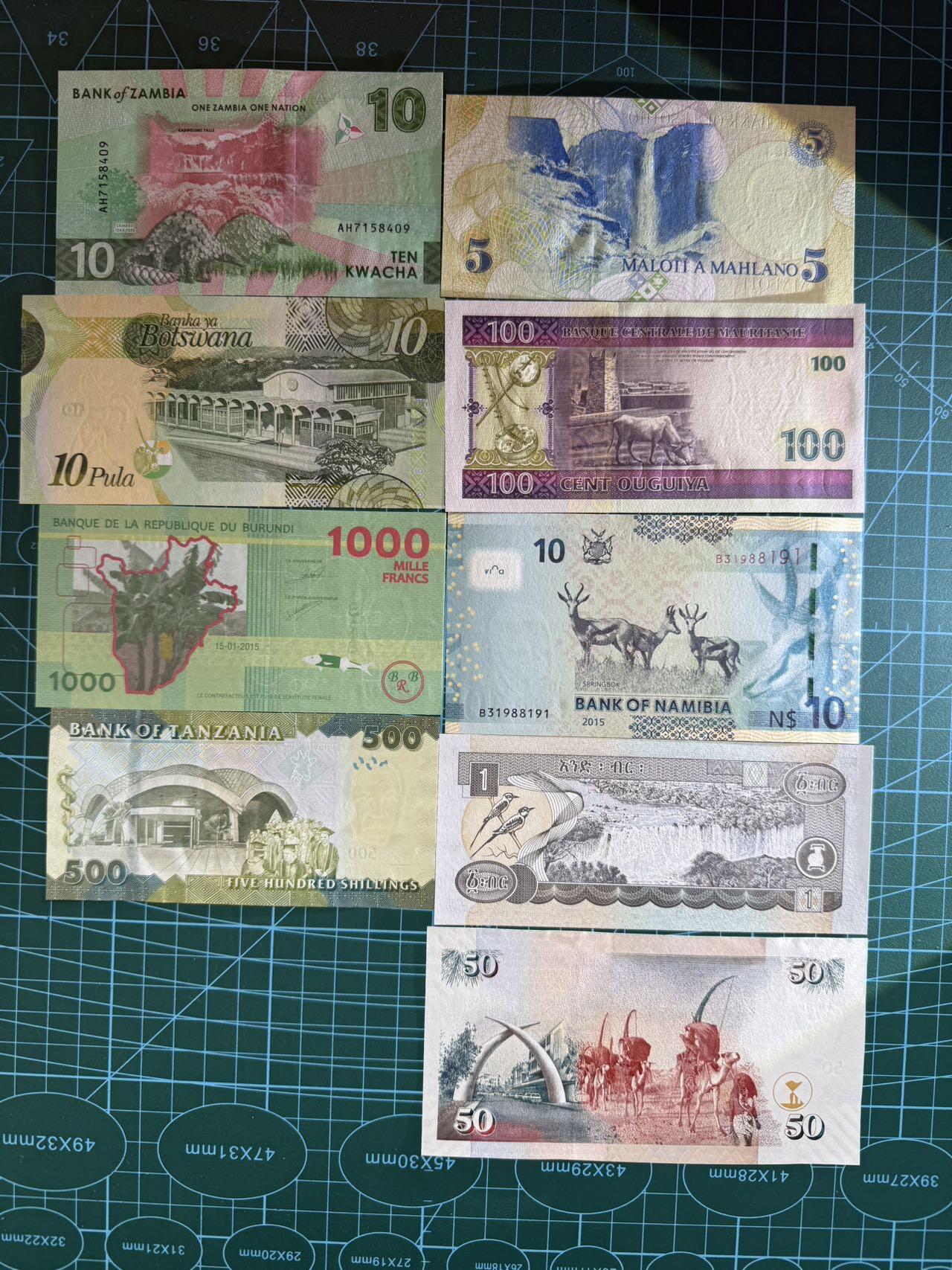 【炜奕收藏】，第四十九期，多套加拿大纸币、港澳靓号 非洲杂钞共9张，UNC品相，包含多张无47