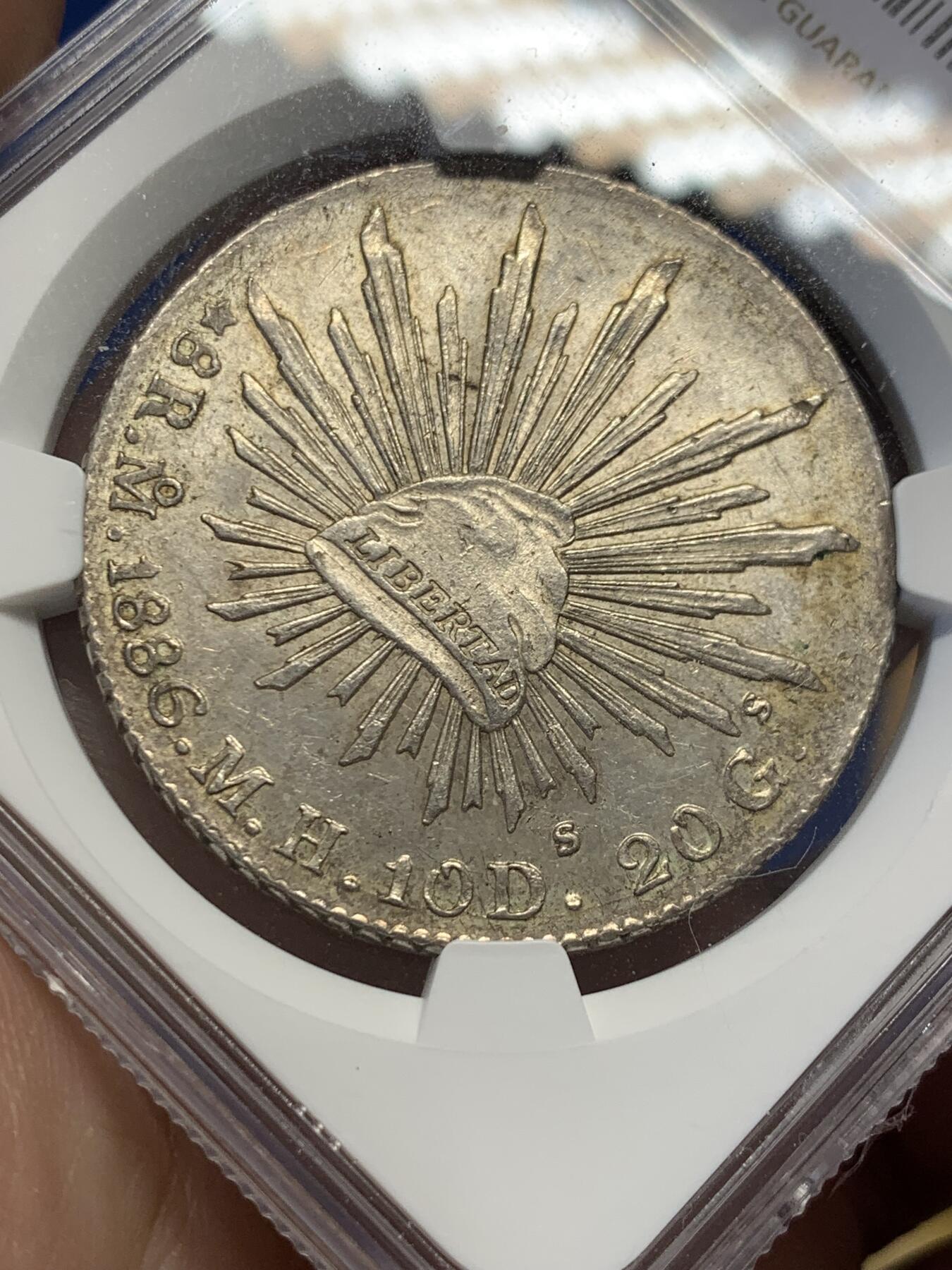 《竞宝斋》第432场 周日，周一 2场连拍 （全场包邮） NGC MS61 墨西哥1886年MO MH版花边鹰洋8R银币，漂亮黄油包浆