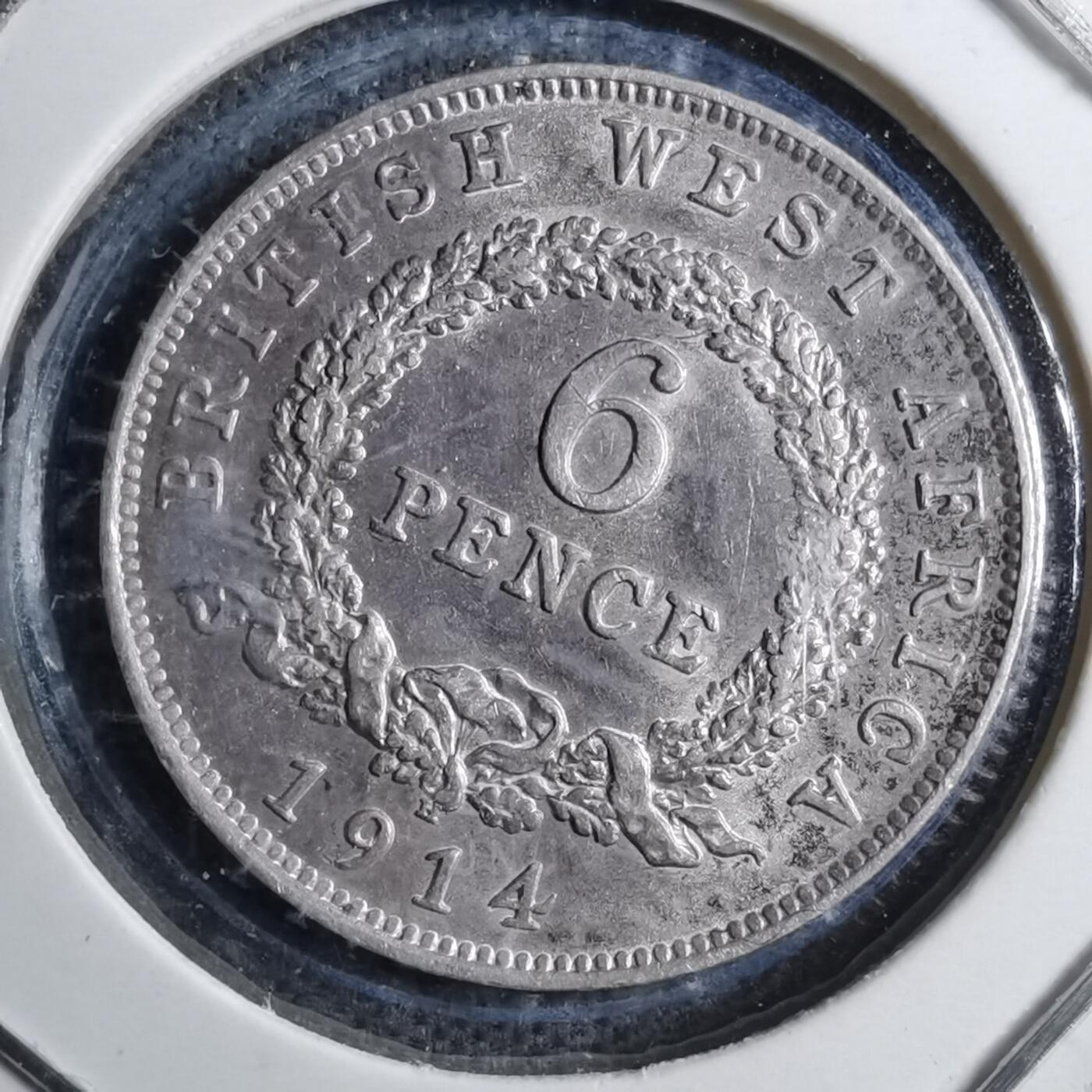 沼泽如烟--第887场 英属西非1914年6便士银币
