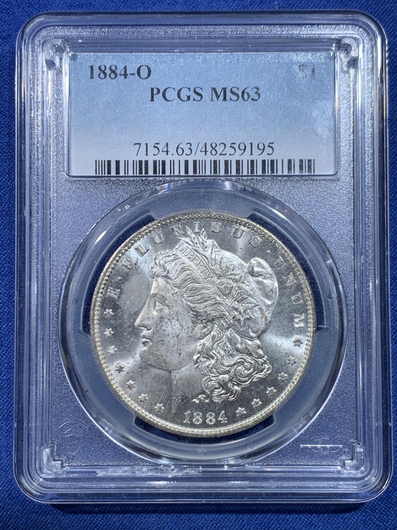 《竞宝斋》第432场 周日，周一 2场连拍 （全场包邮） PCGS MS63 美国1884-O摩根银币 转光品相底板好，盒子边沿小磕