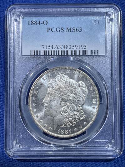 《竞宝斋》第432场 周日，周一 2场连拍 （全场包邮） - PCGS MS63 美国1884-O摩根银币 转光品相底板好，盒子边沿小磕