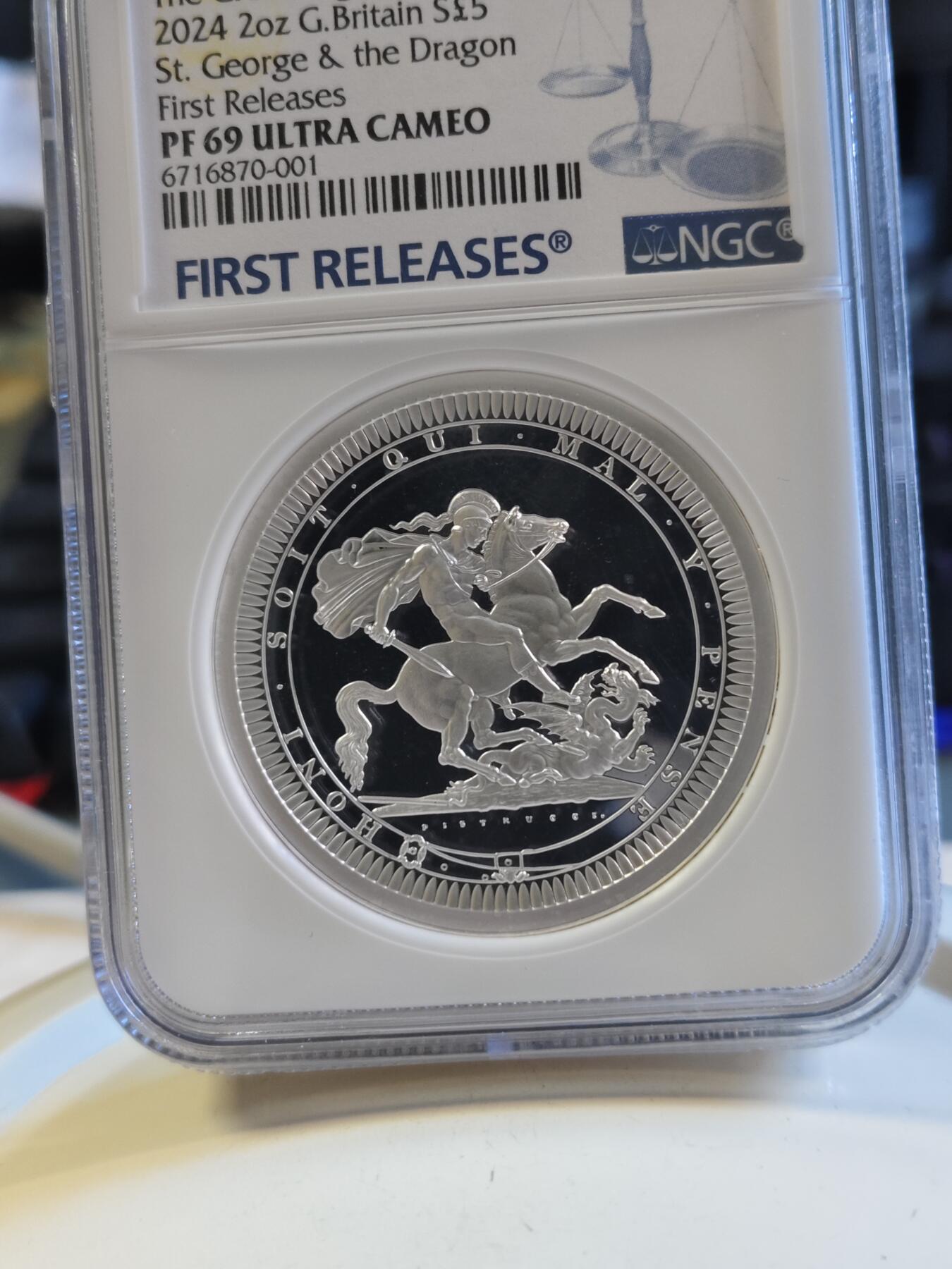 第179期拍卖【长期征集拍品】 2024年英国5镑 伟大雕刻师系列马剑精制纪念2盎司银币NGC PF69首期 蓝无盒证书。2盎司，999银