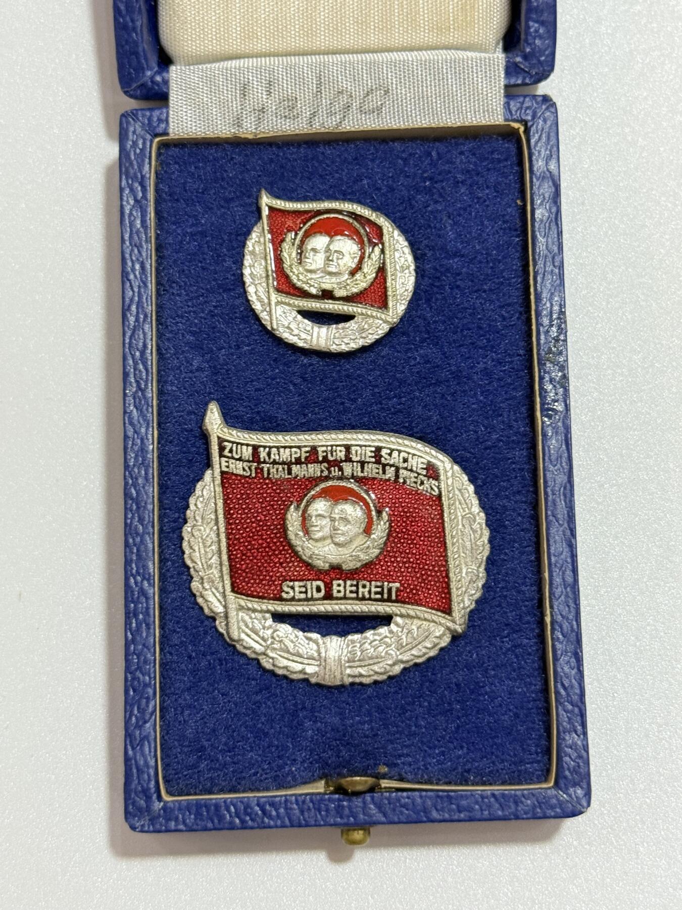 韵星假日精品2025秋季军品类拍卖会-- Rimey Holidays Boutique 2025 Autumn Militaria Sale 民主德国银级恩格斯台尔曼社会主义先锋奖章带盒略一套