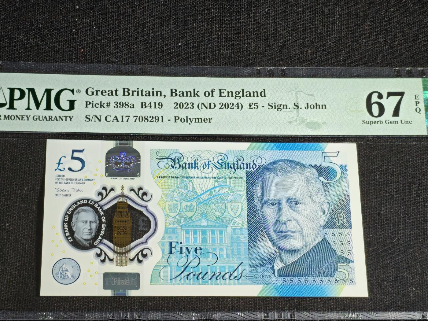 刘世昌艺术品销售中心～虎踞龙蟠*金杨在线联拍群第508期 英国2023年5镑（PMG 67E 号码：CA17 708291）1枚。