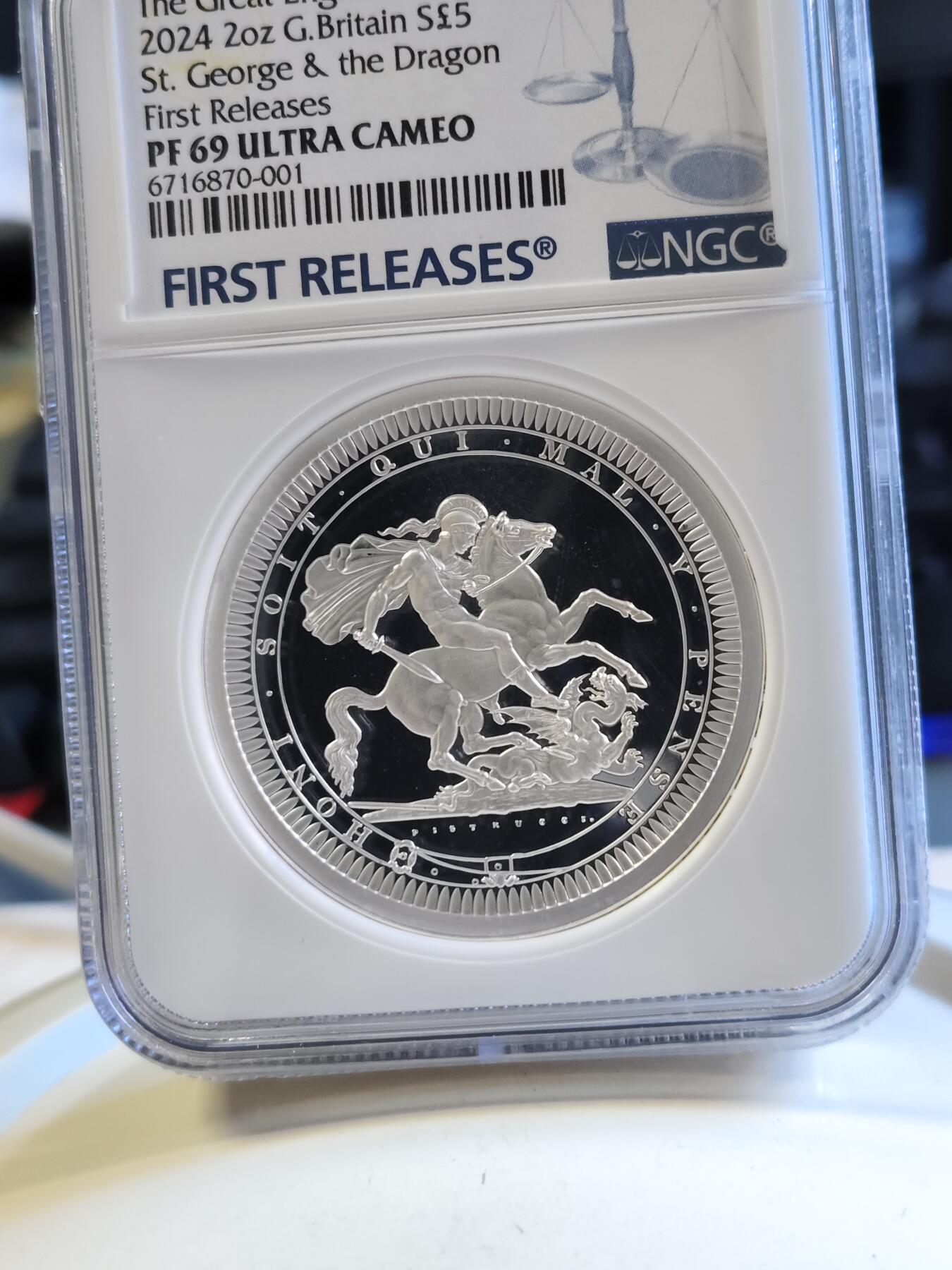 第179期拍卖【长期征集拍品】 2024年英国5镑 伟大雕刻师系列马剑精制纪念2盎司银币NGC PF69首期 蓝无盒证书。2盎司，999银