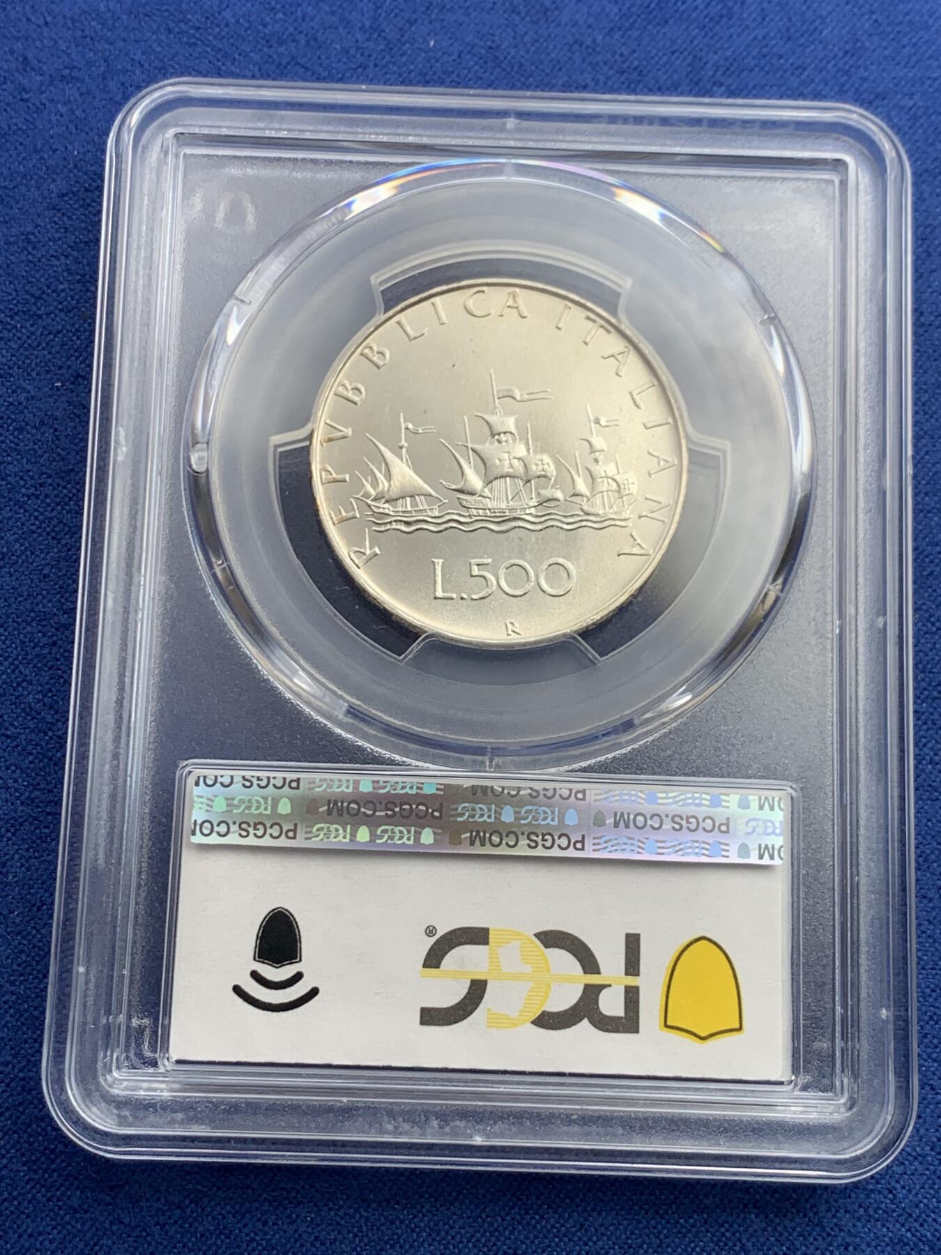 《竞宝斋》第432场 周日，周一 2场连拍 （全场包邮） PCGS MS67 亚军分 意大利1983年帆船少女500里拉银币，经典品种，特年，普制版中书价最高的年份之一，铸量不到77000枚，60分书价已高达105美元。淡彩包浆，银光不错，更高仅3枚68